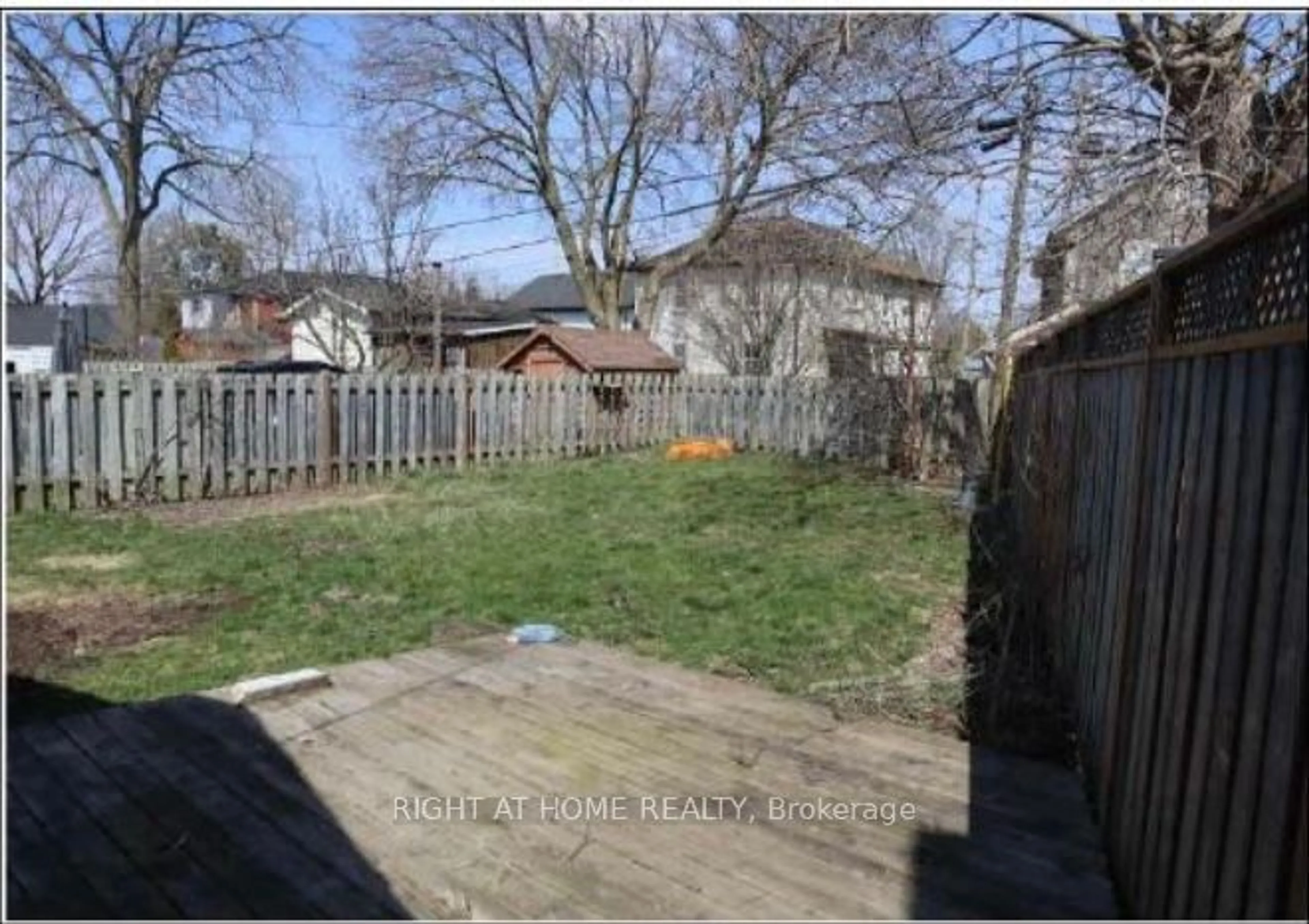 Frontside or backside of a home, the fenced backyard for 42 RICH Ave, Cambridge Ontario N1R 2A5