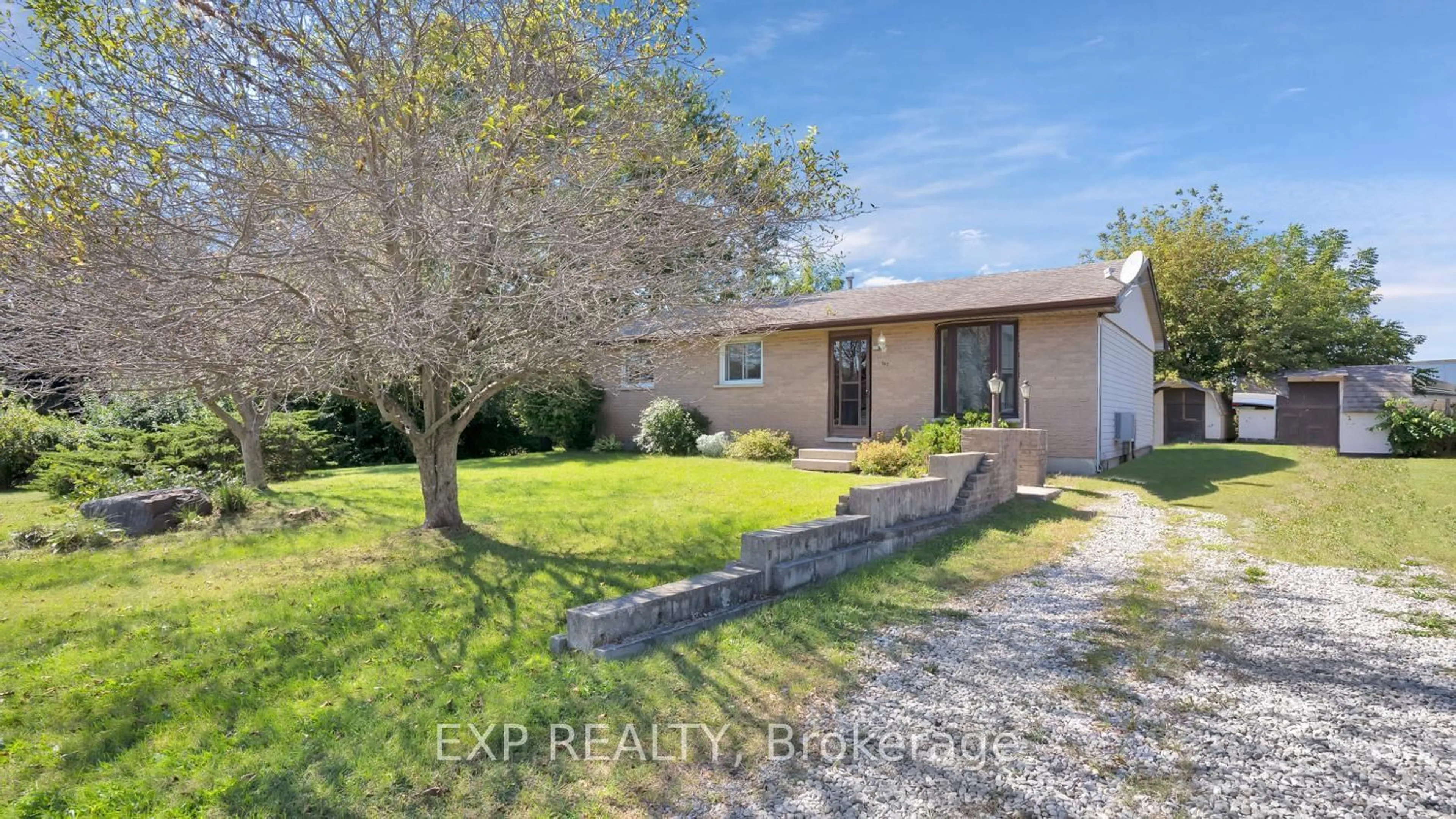 Frontside or backside of a home, the fenced backyard for 167 Railway Ave, Middlesex Centre Ontario N0L 1R0