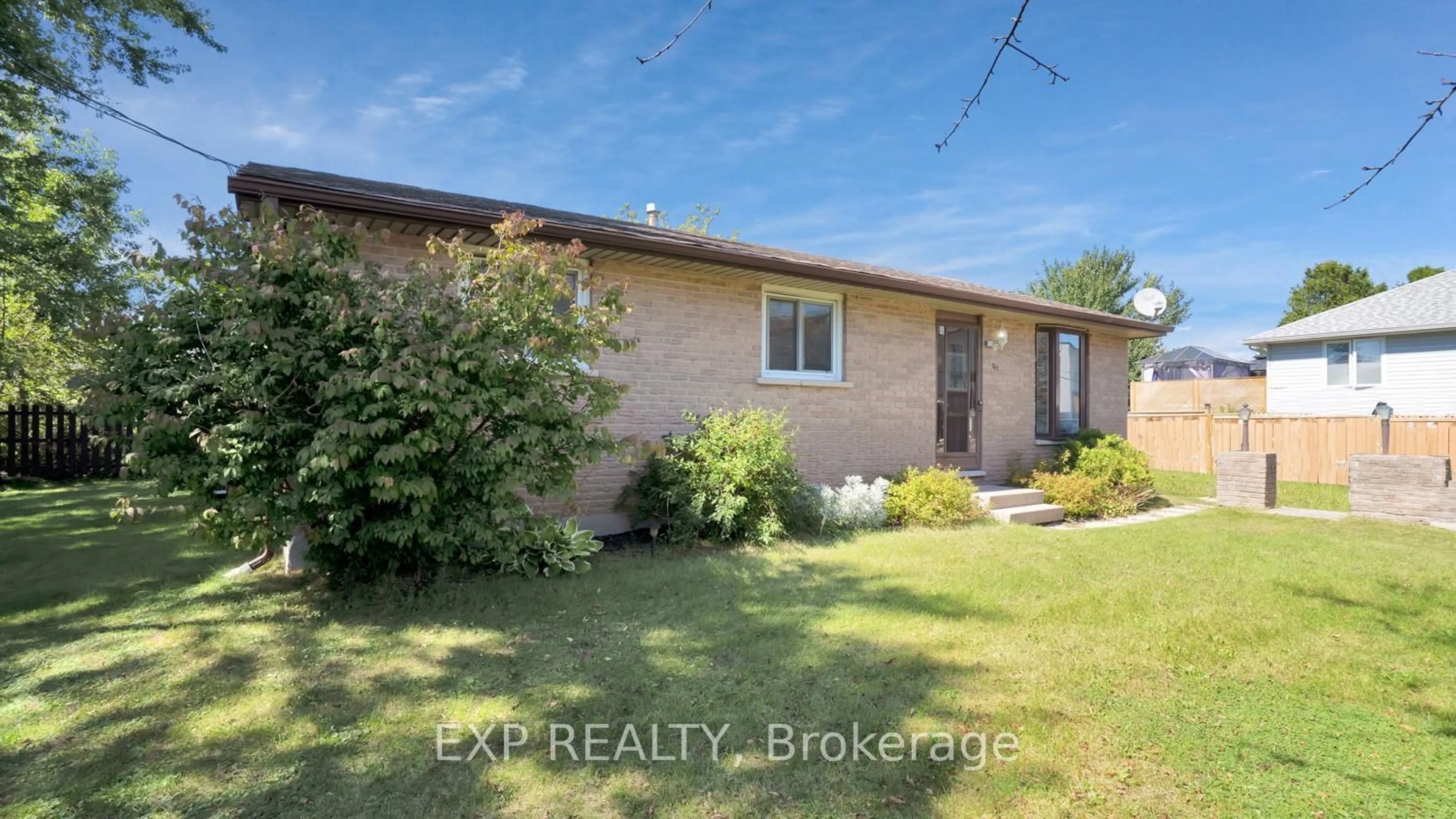 Frontside or backside of a home, the fenced backyard for 167 Railway Ave, Middlesex Centre Ontario N0L 1R0