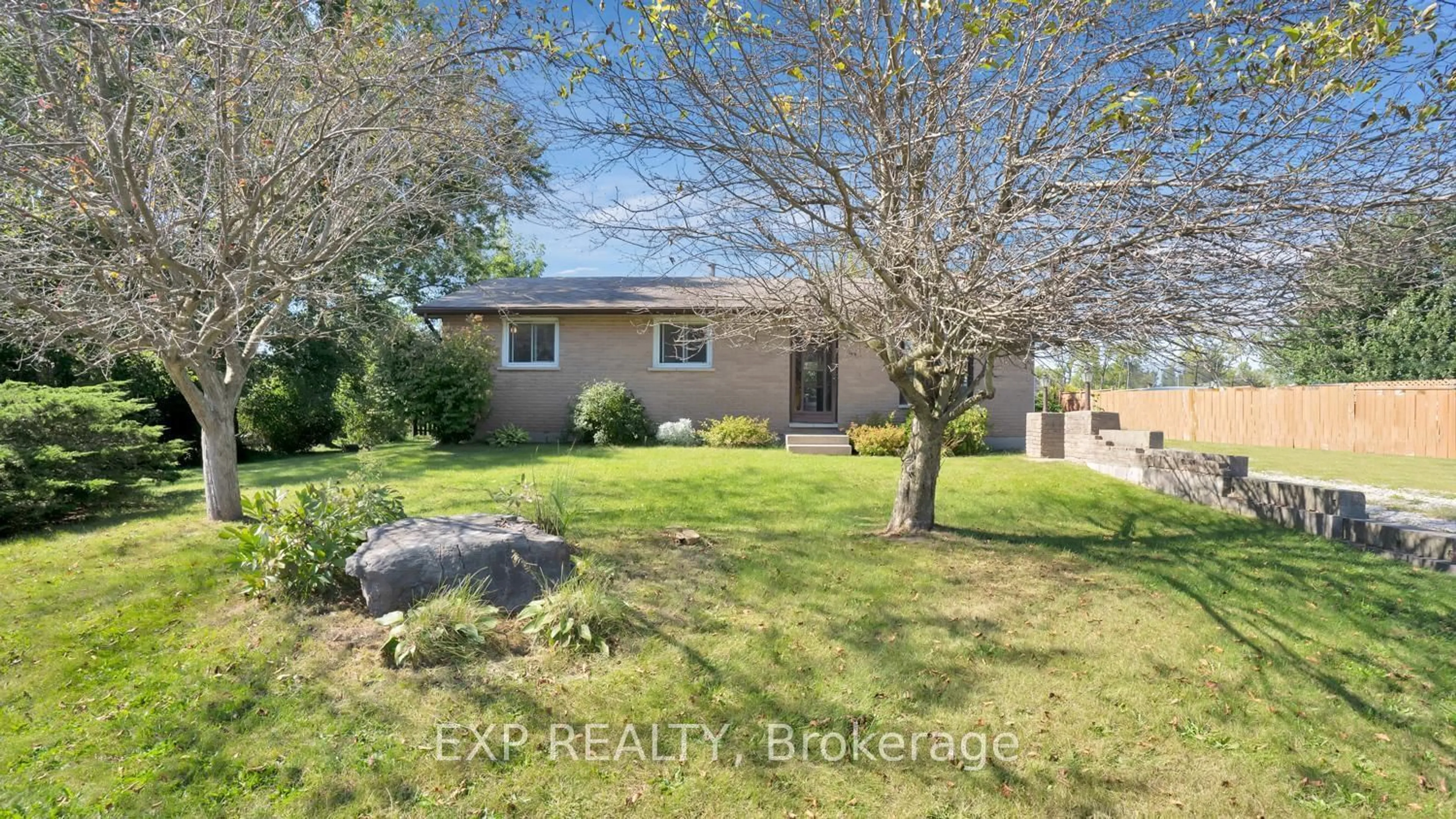 Frontside or backside of a home, the fenced backyard for 167 Railway Ave, Middlesex Centre Ontario N0L 1R0