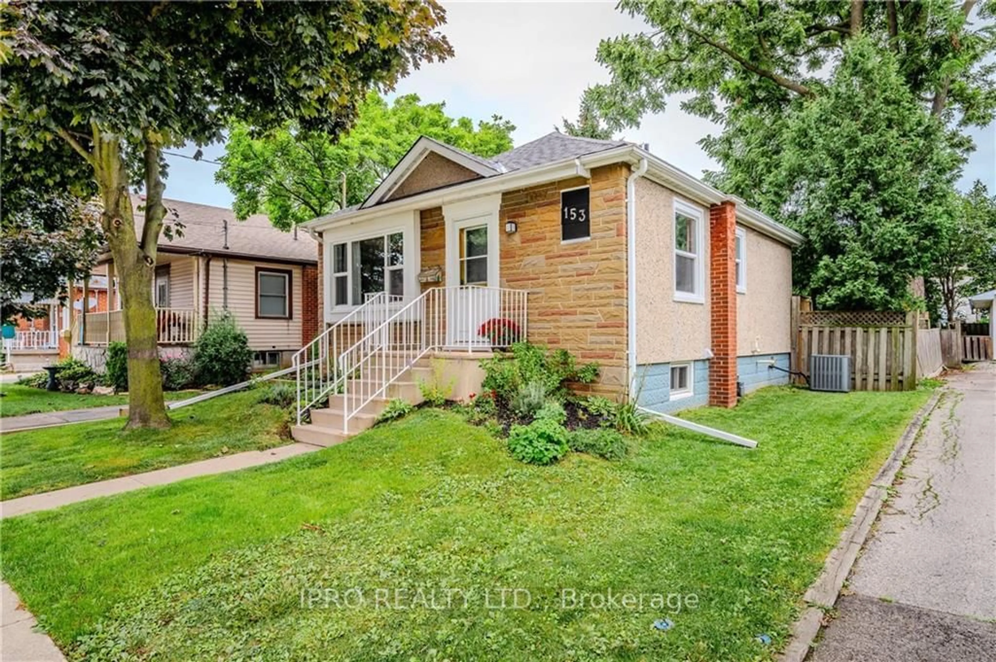 Frontside or backside of a home for 153 East 18th St, Hamilton Ontario L9A 4P2