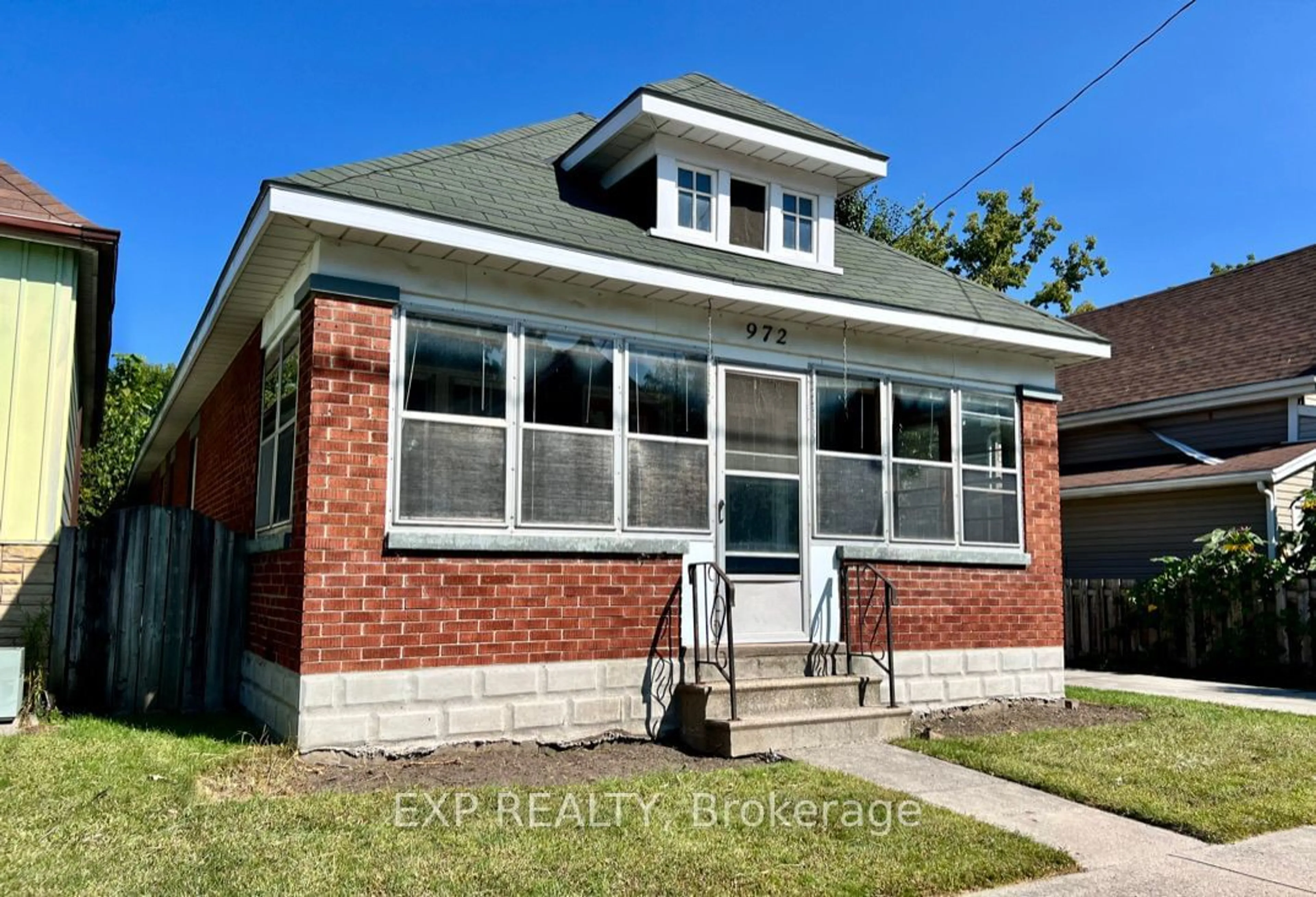 Home with brick exterior material for 972 Dame St, London Ontario N5Z 1M6