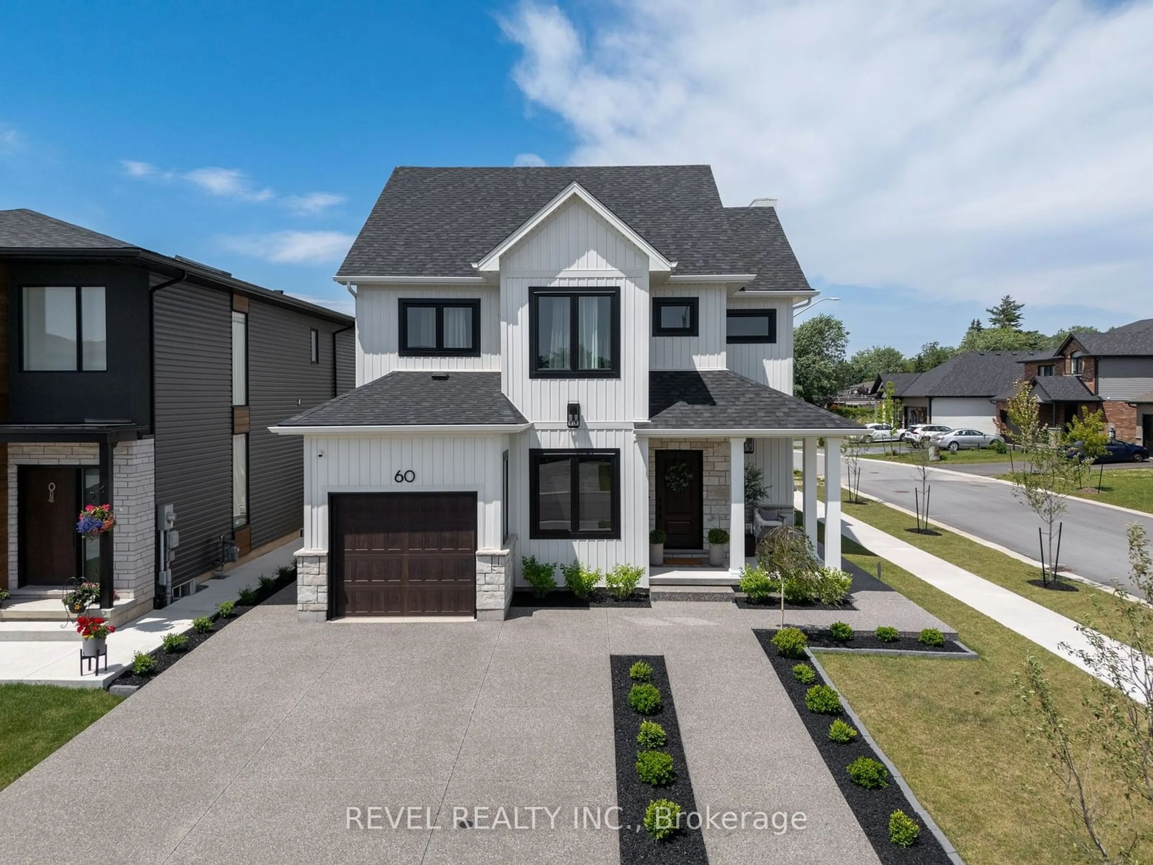 Frontside or backside of a home, the street view for 60 Kensington St, Welland Ontario L3C 0G4