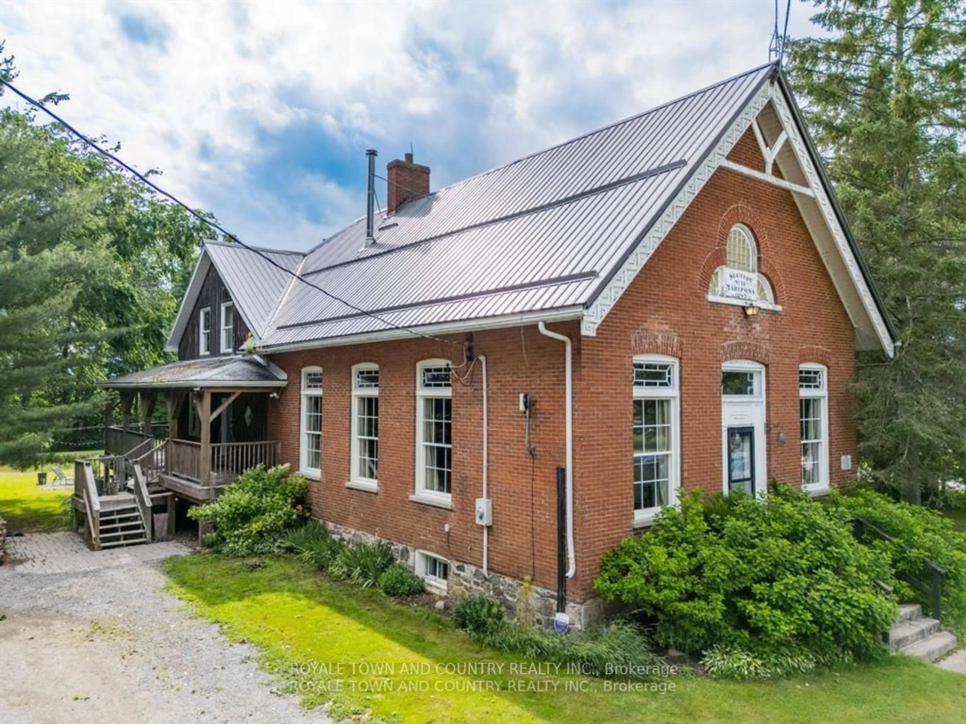 Home with brick exterior material for 275 Valentia Rd, Kawartha Lakes Ontario K0M 2C0