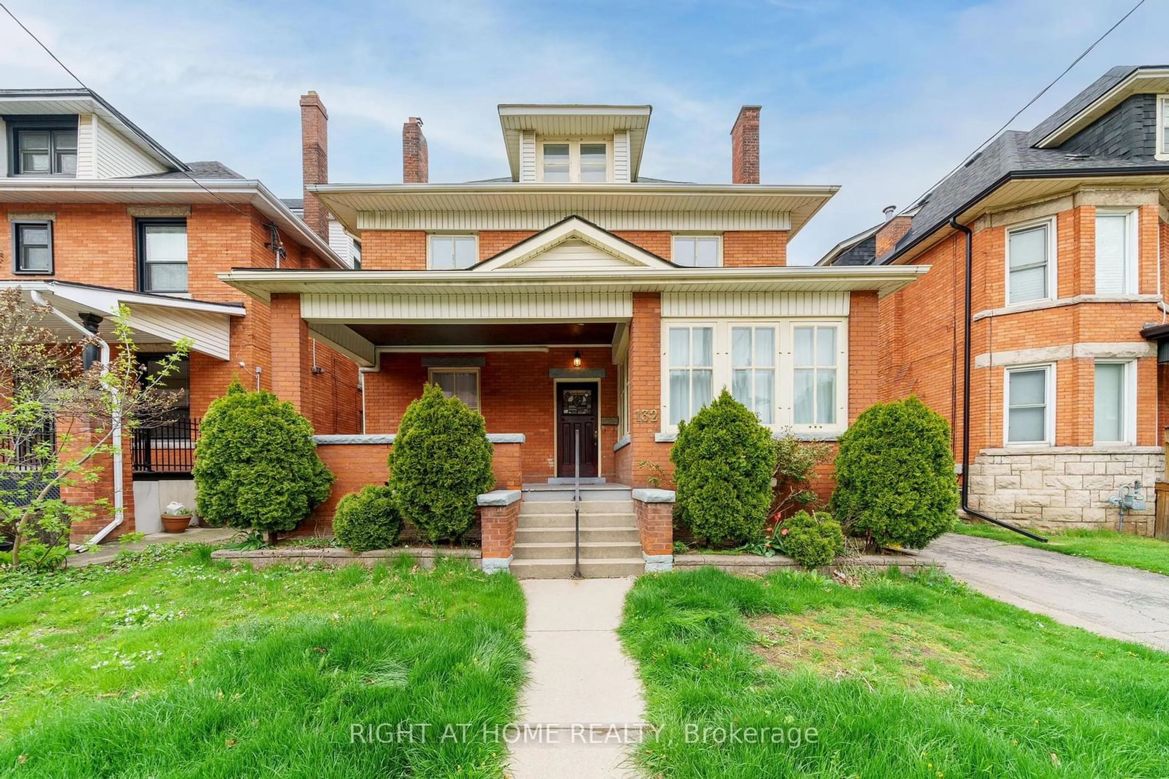 Home with brick exterior material, street for 132 Holton Ave, Hamilton Ontario L8M 2L5