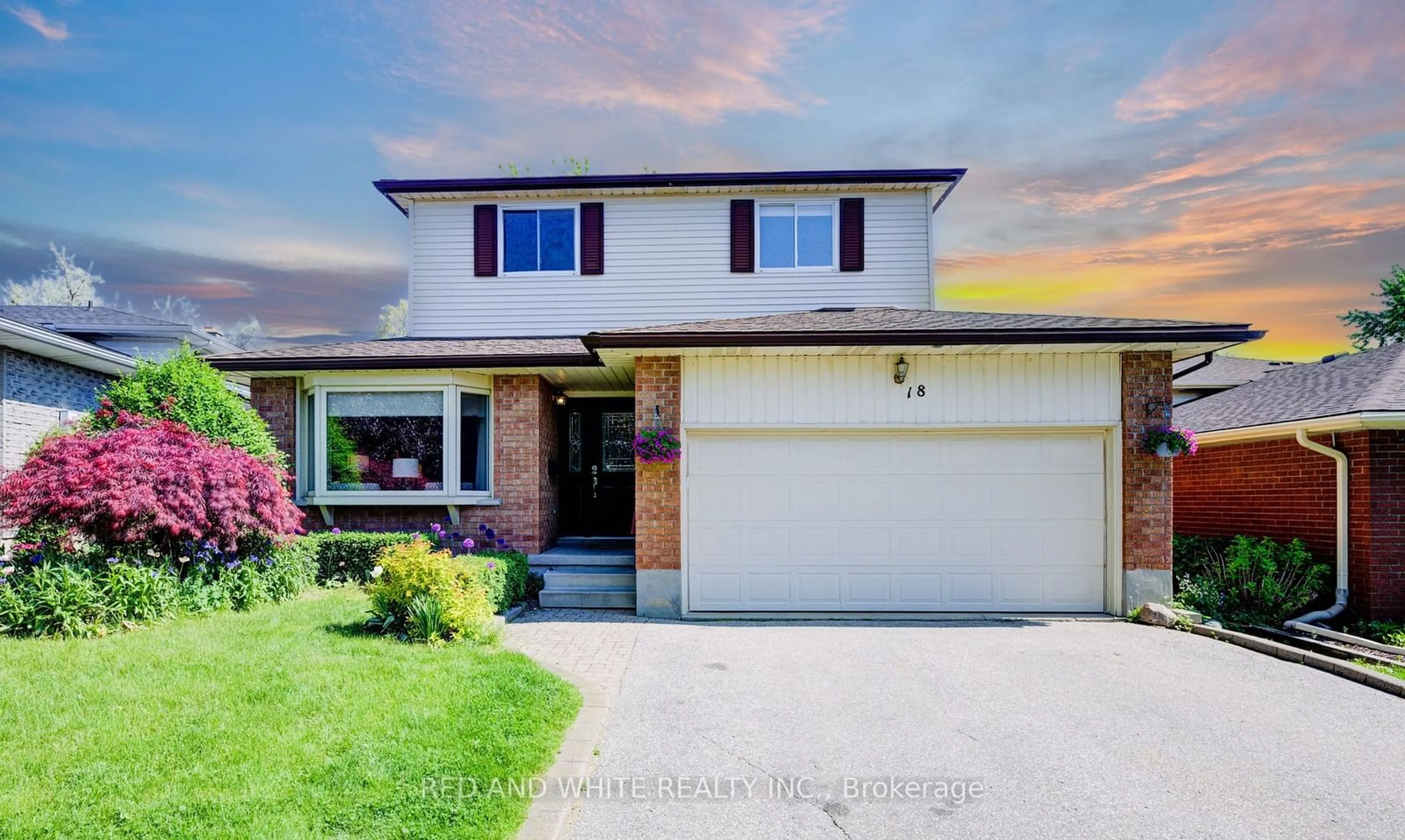 Frontside or backside of a home, the street view for 18 Windermere Crt, Kitchener Ontario N2N 2W4