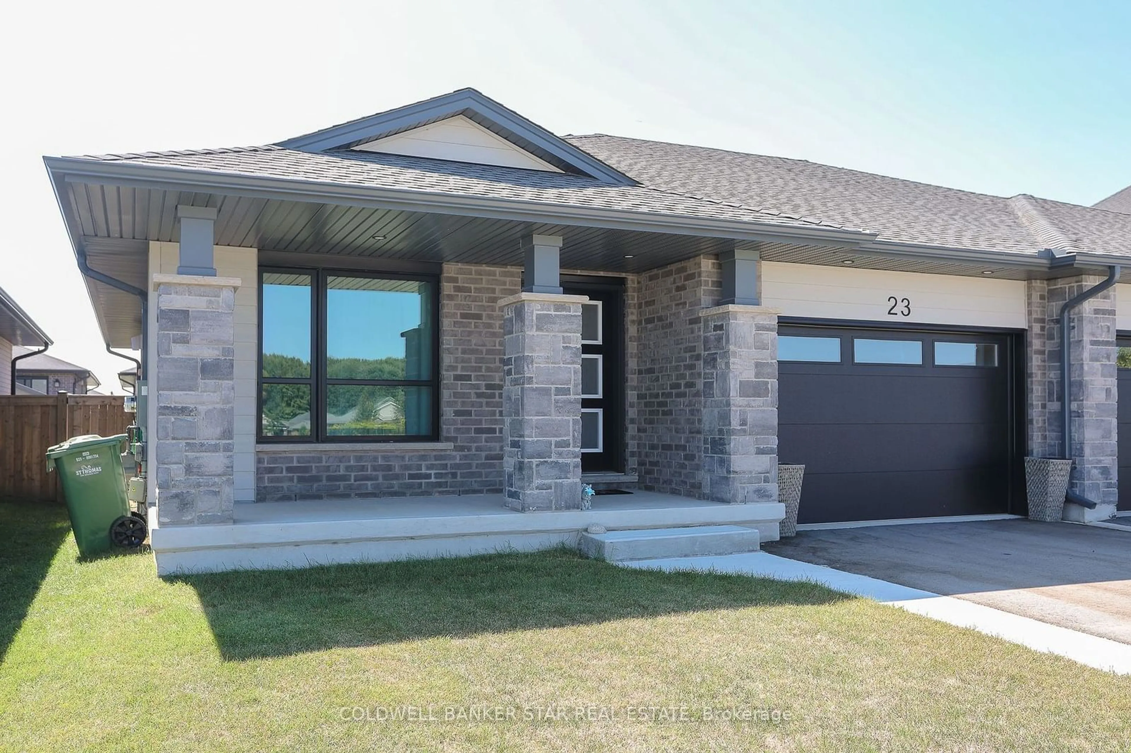 Home with brick exterior material for 23 Feathers Crossing, St. Thomas Ontario N5R 0M4