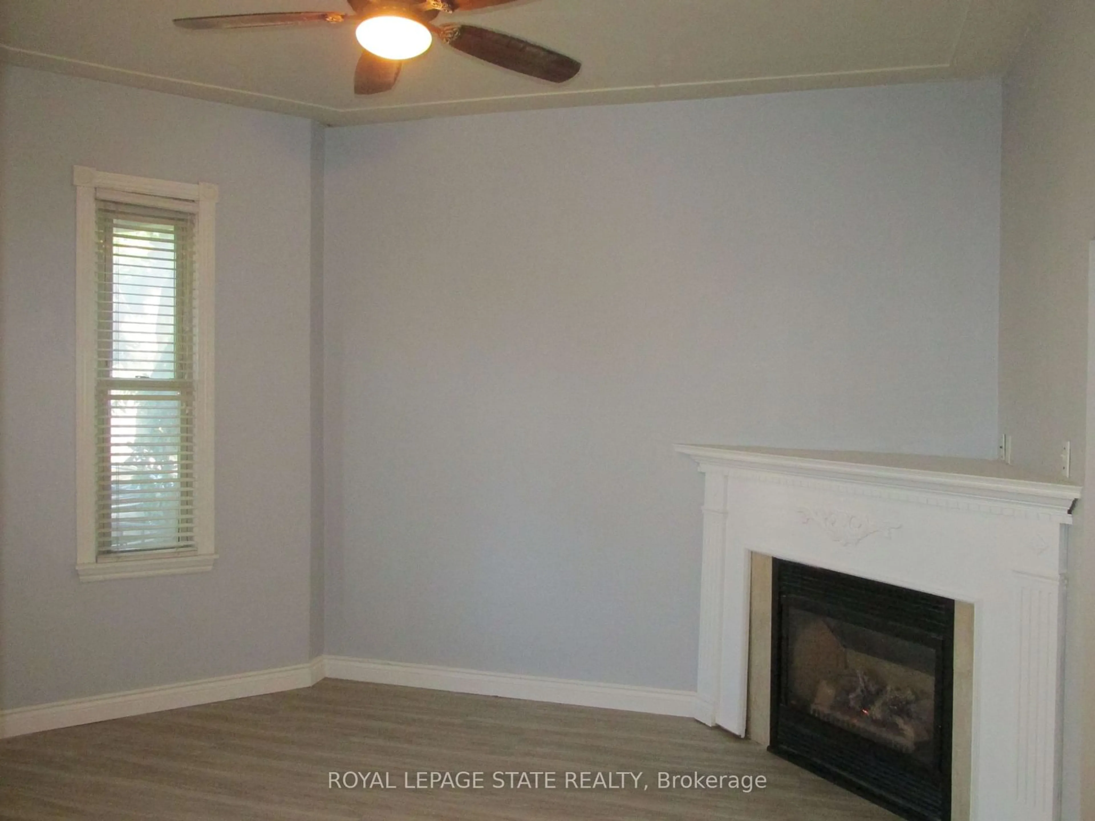 A pic of a room, wood floors for 86 Earl St, Hamilton Ontario L8L 6L3