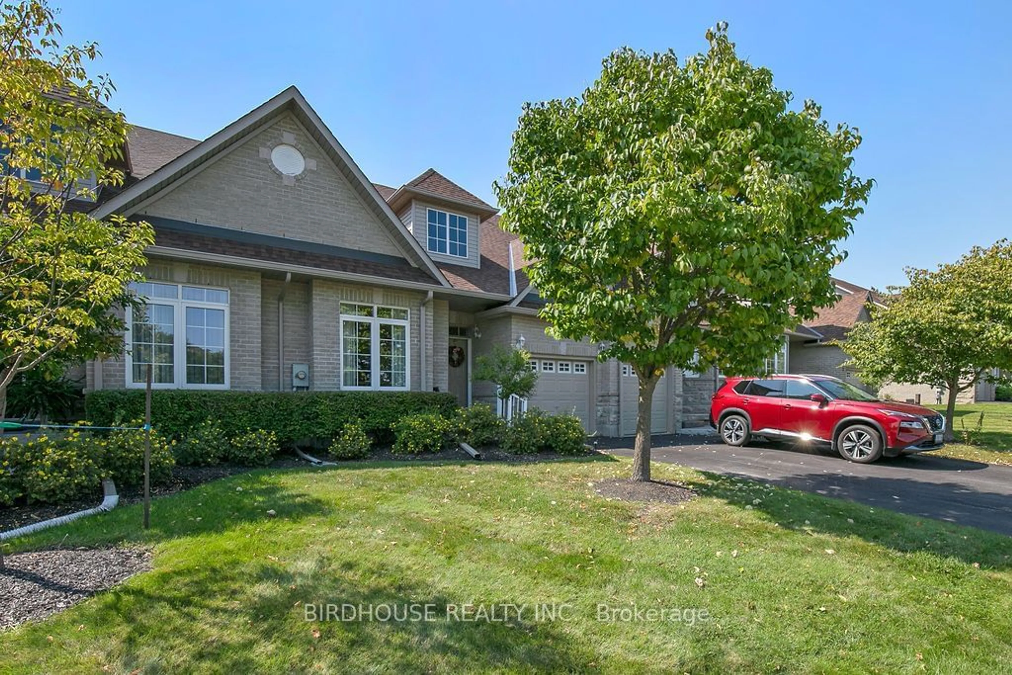 Frontside or backside of a home, the street view for 31 Rivermill Blvd #7F, Kawartha Lakes Ontario K9V 6K6