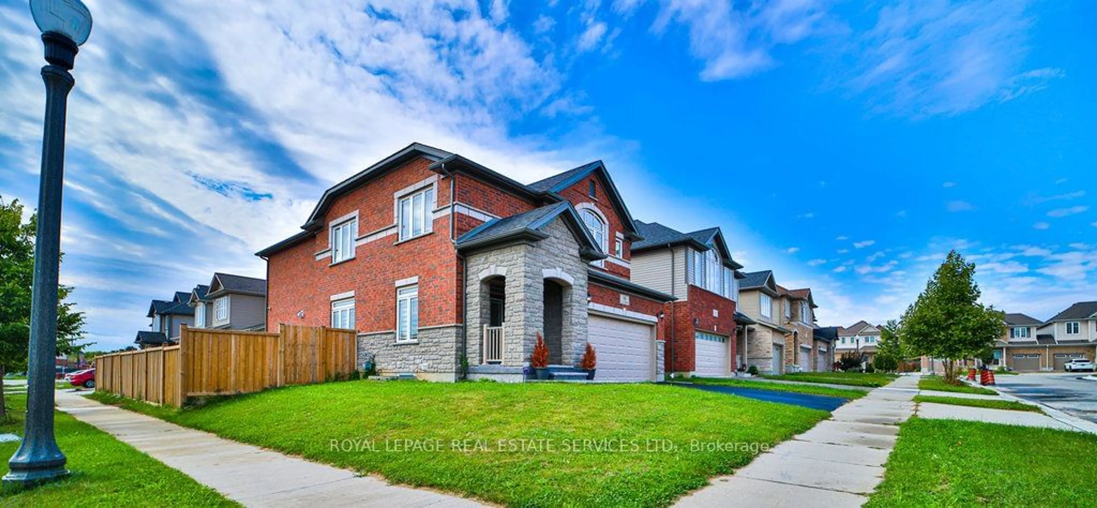 Home with brick exterior material, street for 18 Valleybrook Dr, Kitchener Ontario N2A 0K1