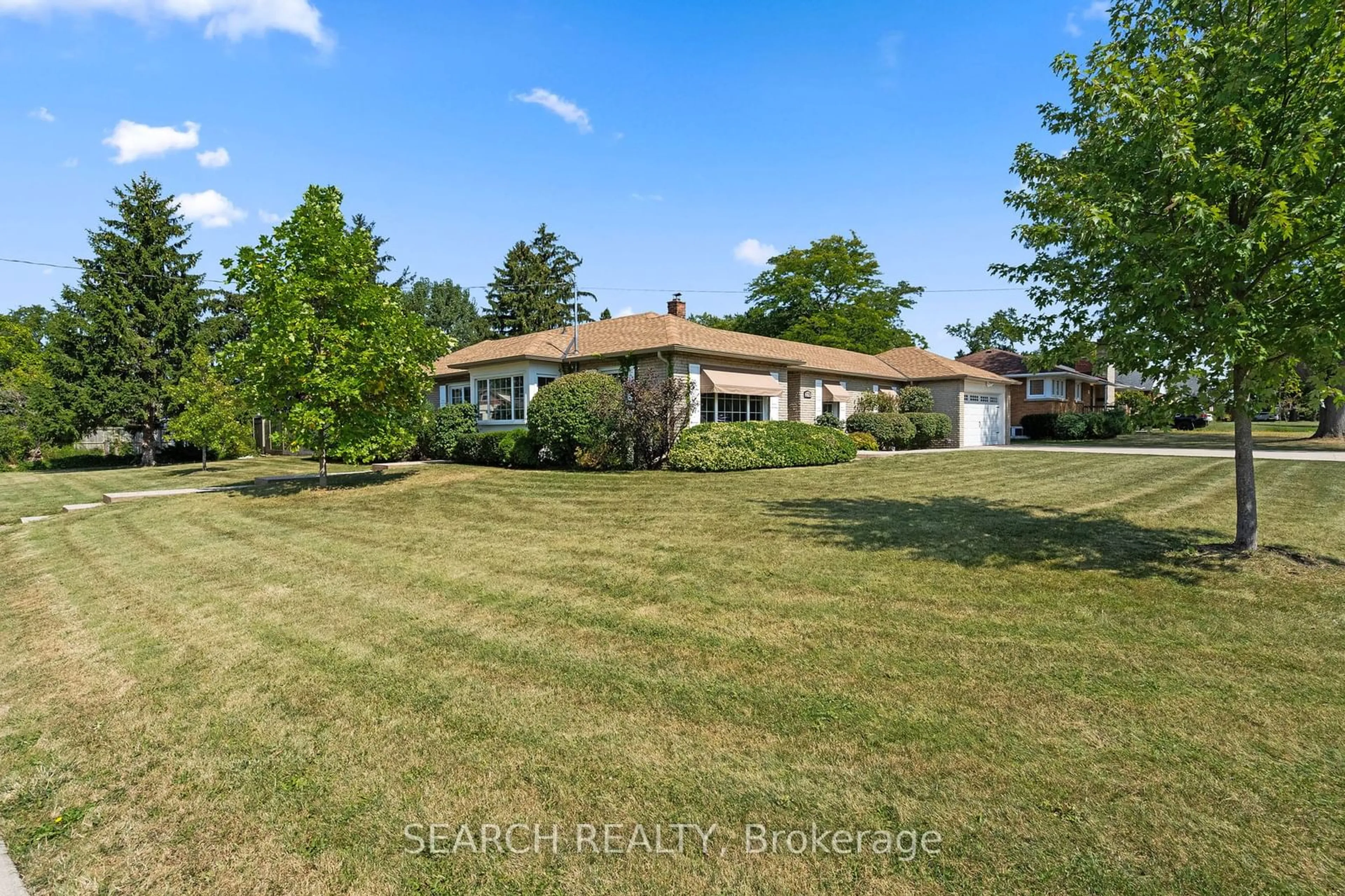 Frontside or backside of a home, the fenced backyard for 270 Highland Ave, Fort Erie Ontario L2A 2X7