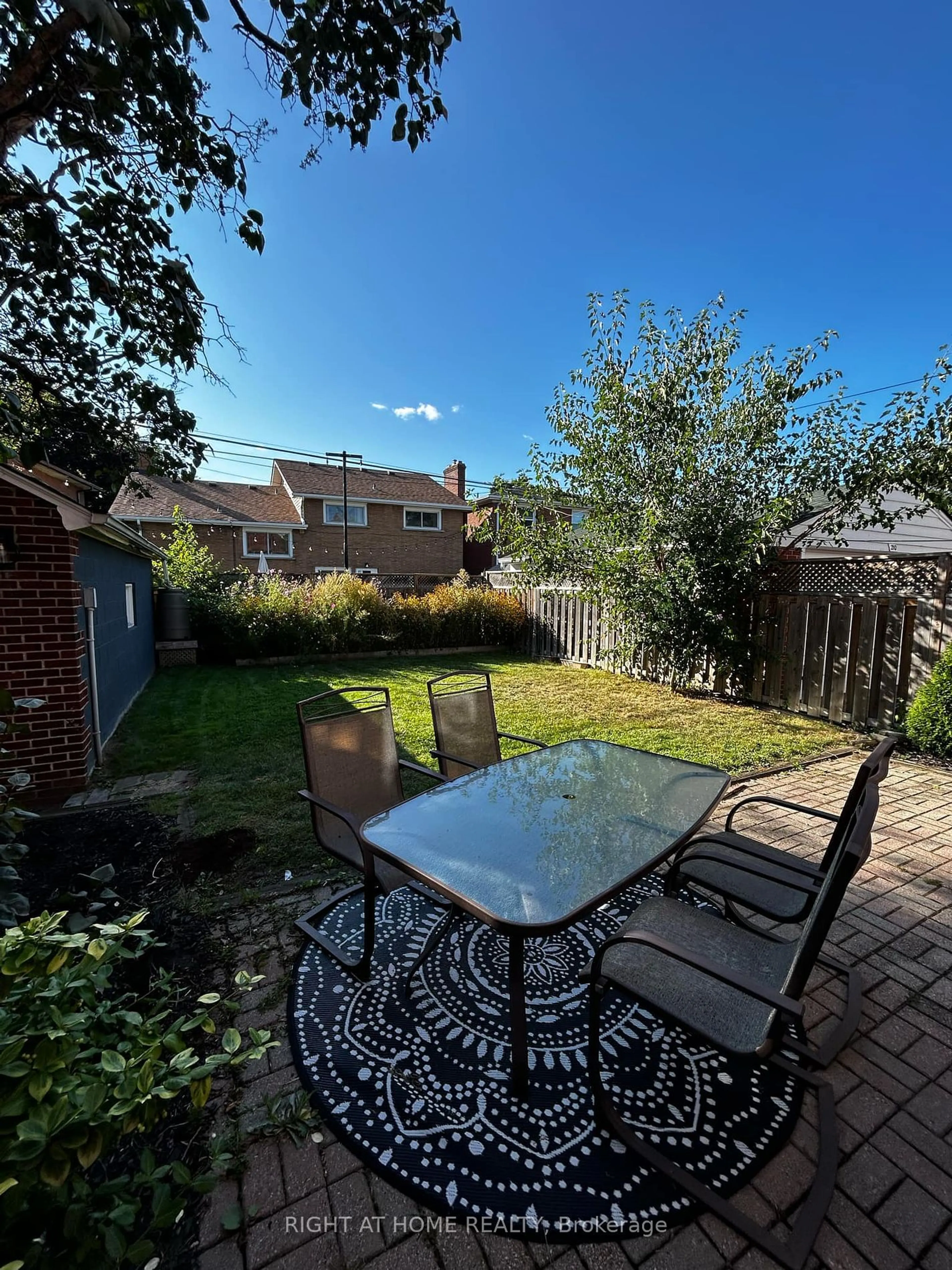 Patio, the fenced backyard for 214 Kenilworth Ave, Hamilton Ontario L8K 2T4