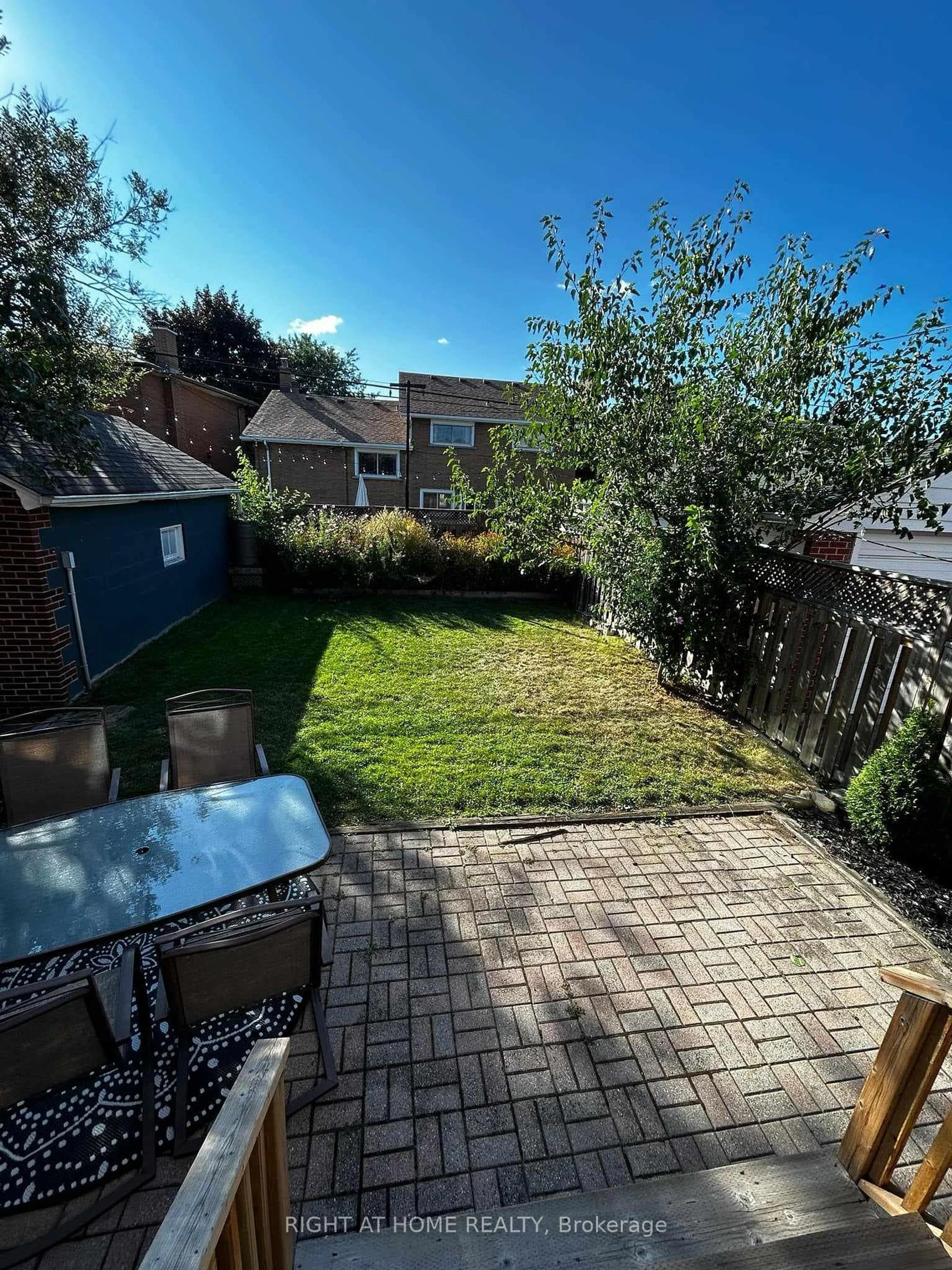 Patio, the fenced backyard for 214 Kenilworth Ave, Hamilton Ontario L8K 2T4