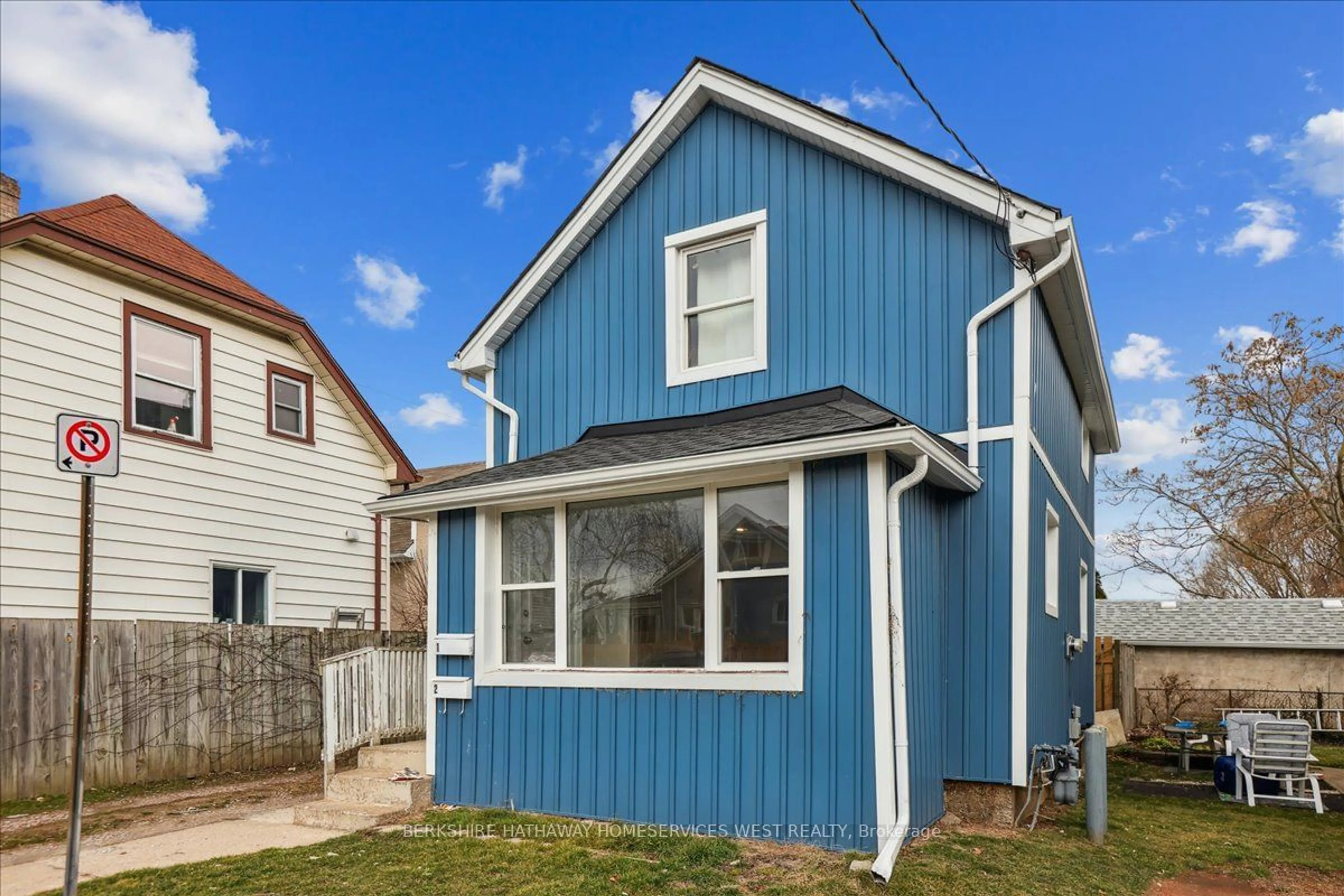 A pic from exterior of the house or condo, the fenced backyard for 19 Seneca St, St. Catharines Ontario L2R 2V1