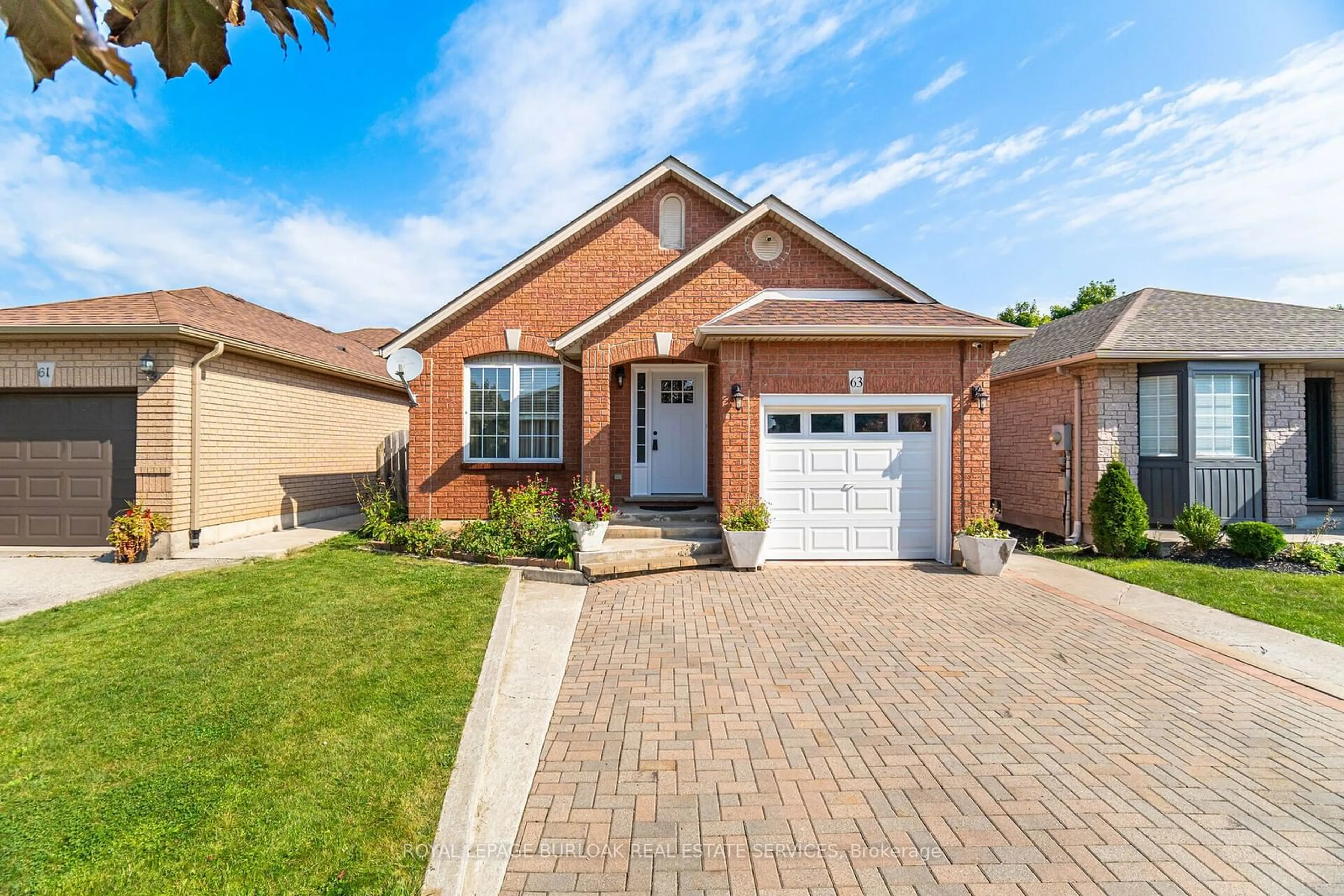 Home with brick exterior material for 63 Hillgarden Dr, Hamilton Ontario L8J 3R3