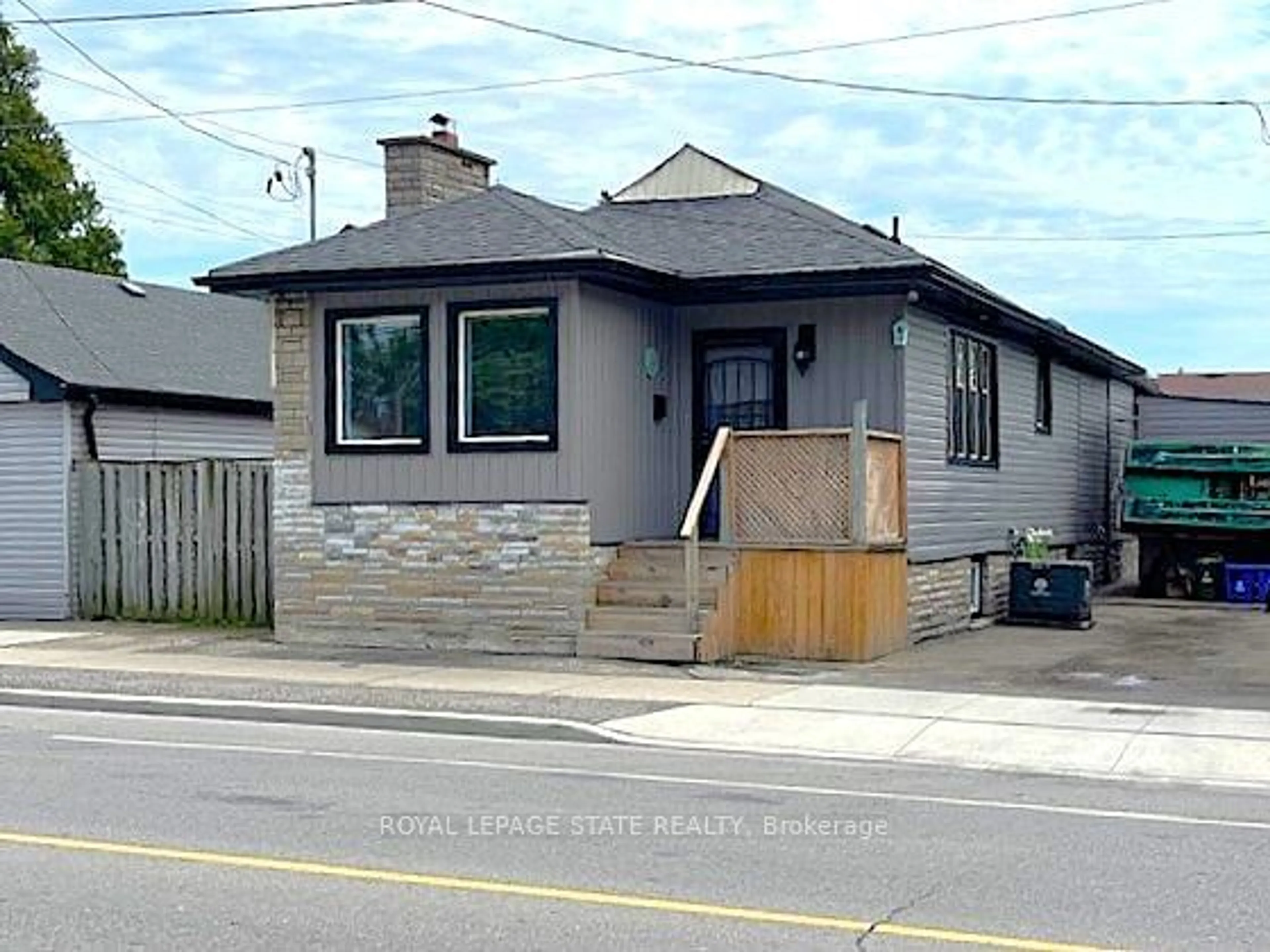 Frontside or backside of a home, the front or back of building for 114 Melvin Ave, Hamilton Ontario L8H 2J6