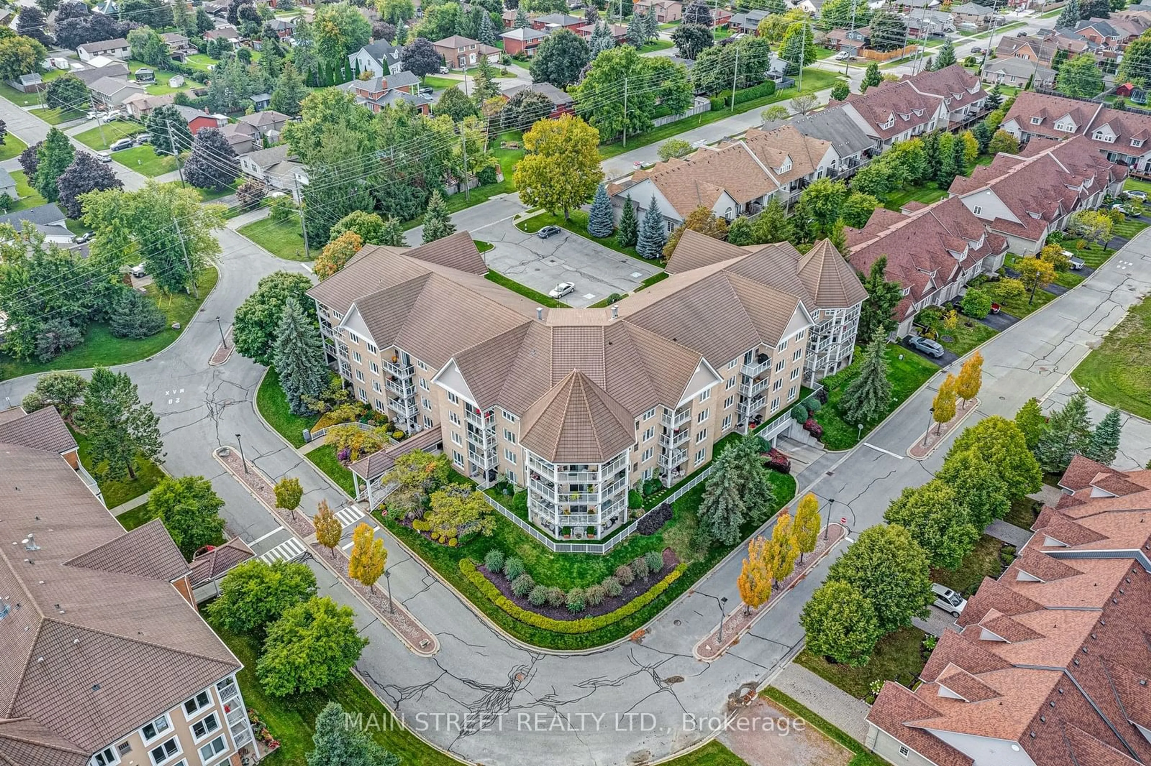 A pic from exterior of the house or condo, the street view for 51 Rivermill Blvd #304, Kawartha Lakes Ontario K9V 6E8