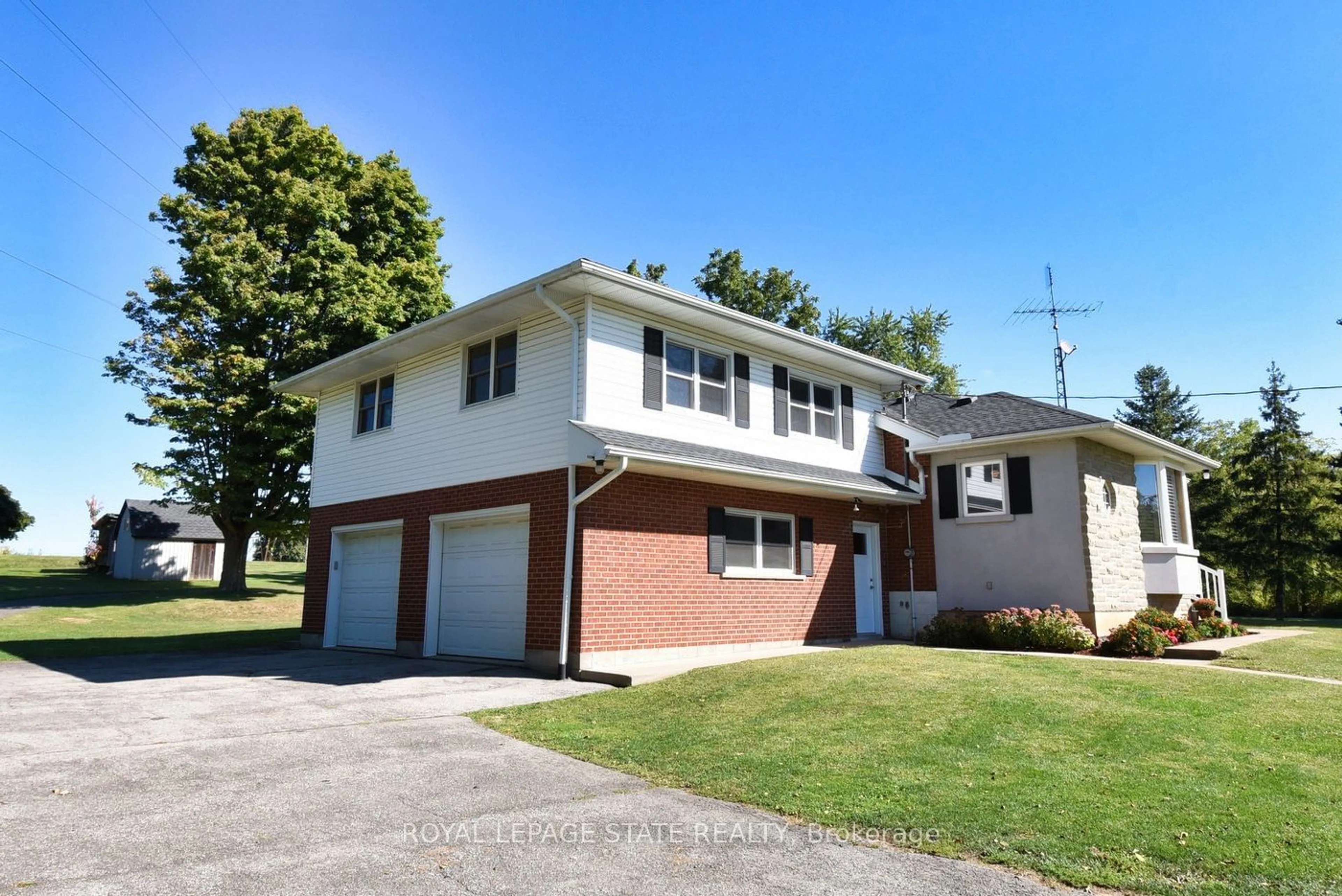 Frontside or backside of a home, the street view for 419 Book Rd, Hamilton Ontario L9G 3L1