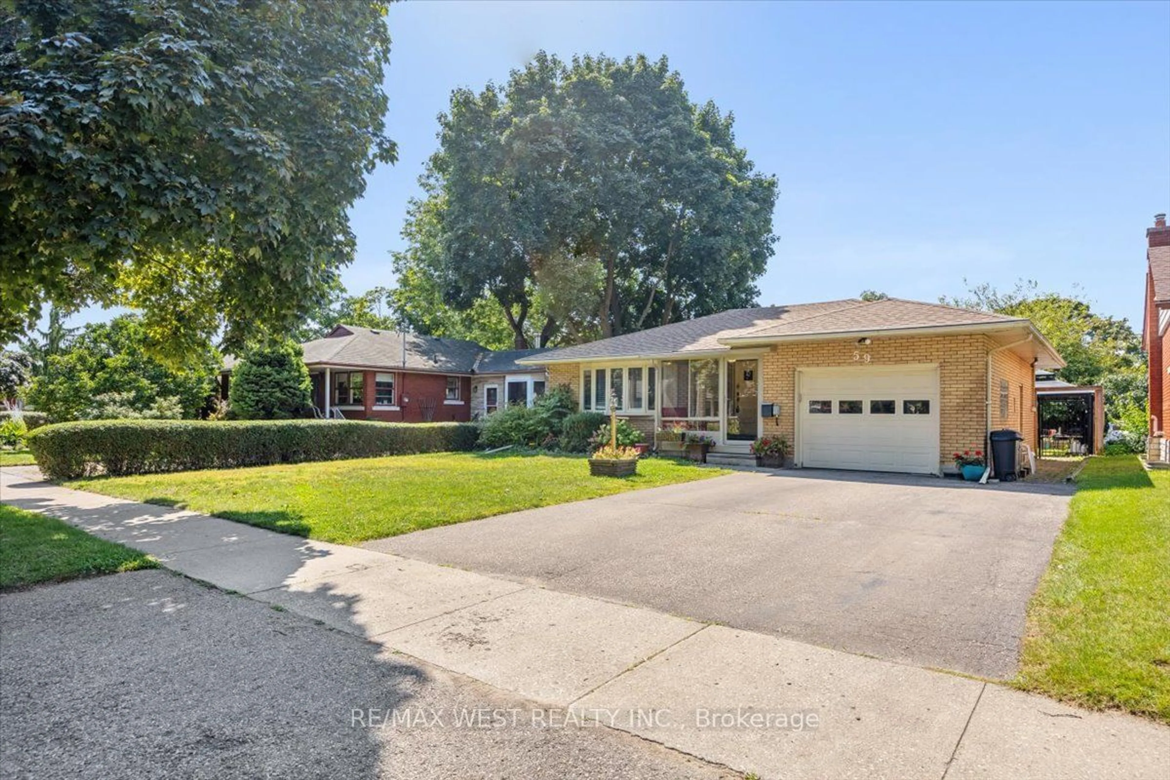 Frontside or backside of a home, the street view for 59 Maywood Rd, Kitchener Ontario N2C 2A2