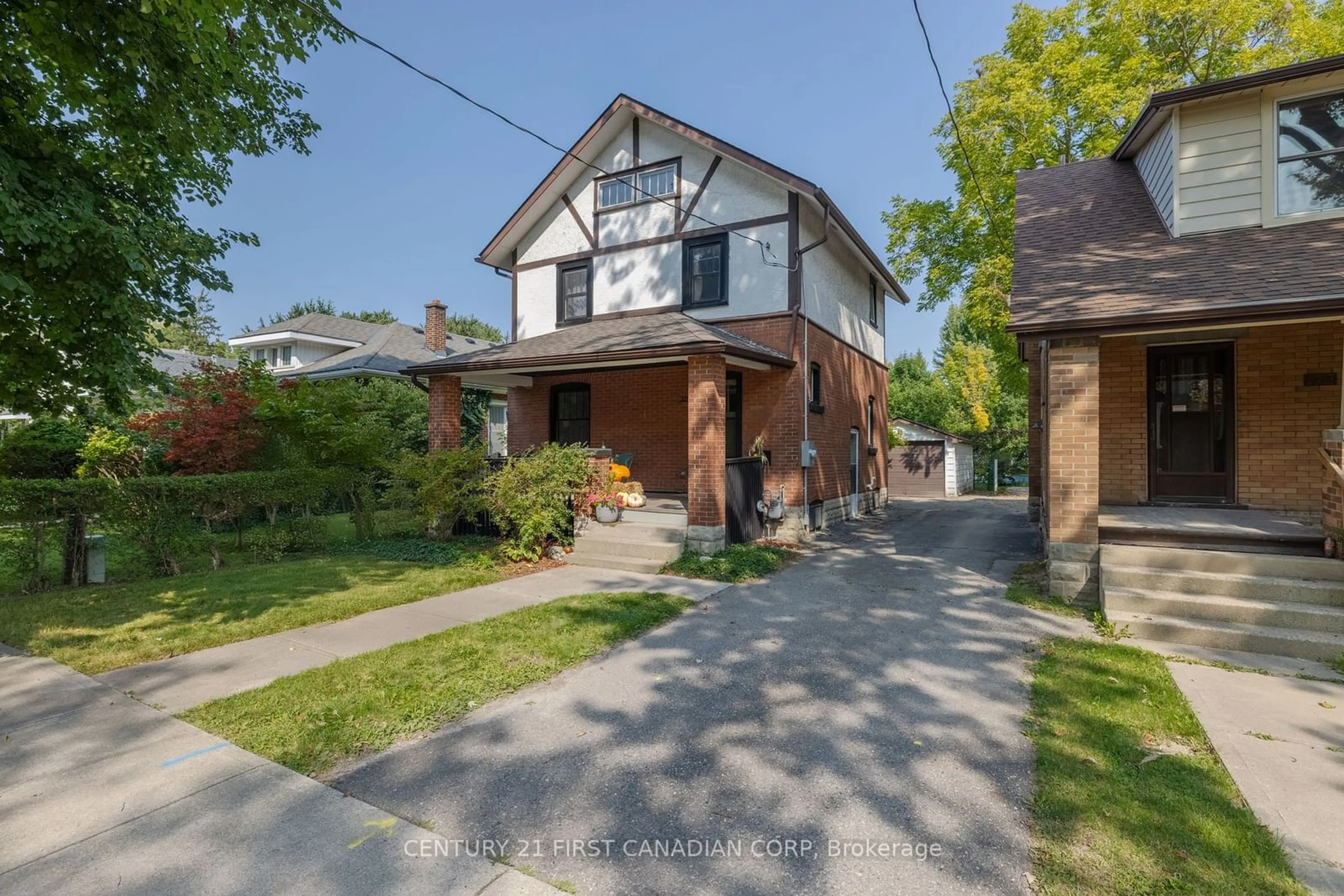 Frontside or backside of a home for 170 Langarth St, London Ontario N6C 1Z5