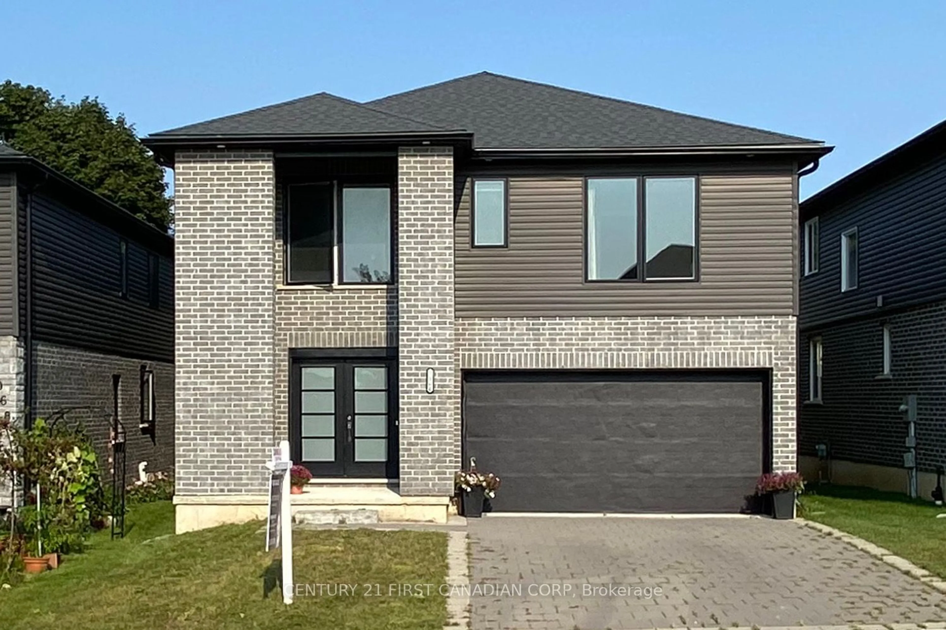 Home with brick exterior material for 2064 TRIBALWOOD St, London Ontario N6G 0J2