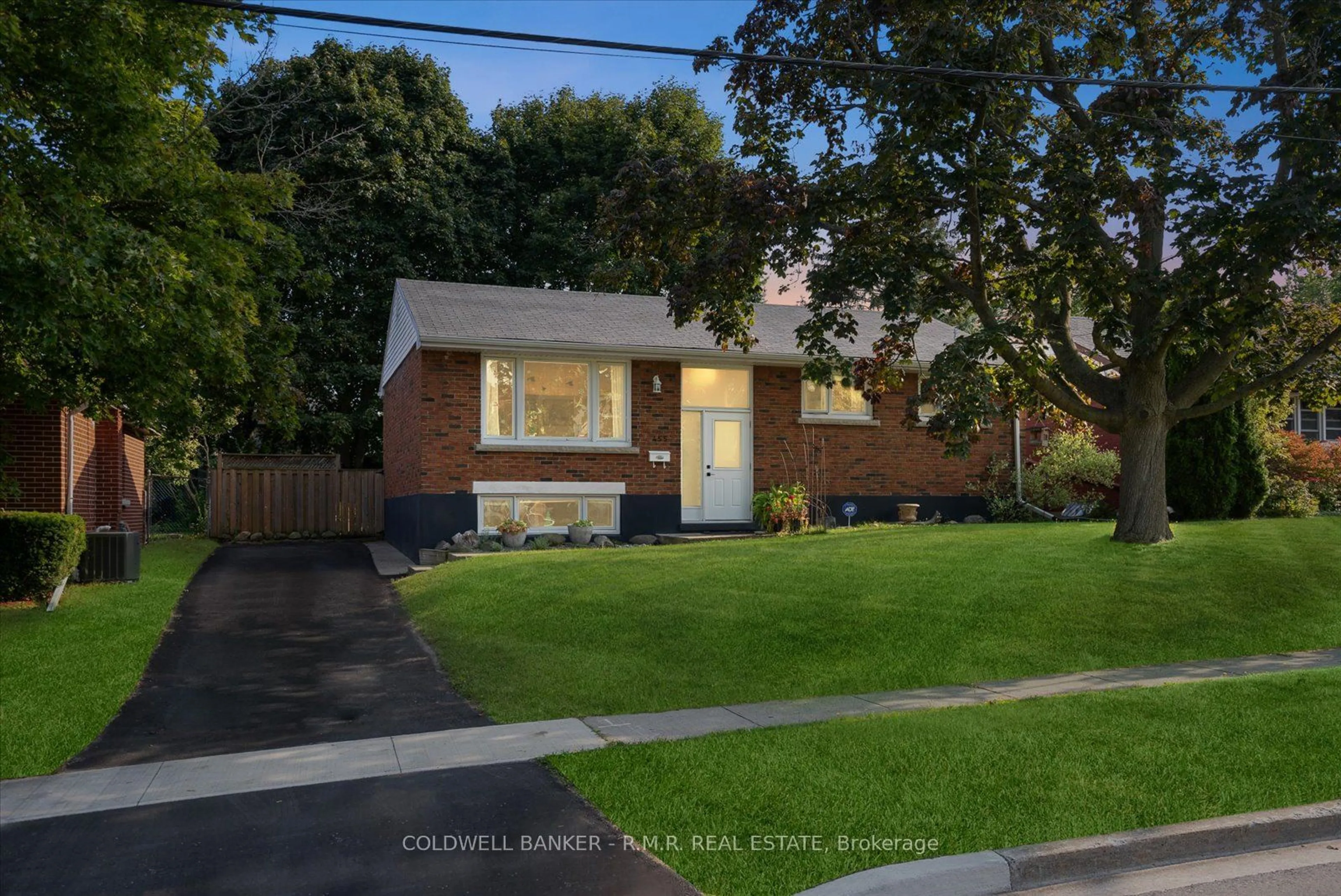 Frontside or backside of a home, the fenced backyard for 455 Harden St, Cobourg Ontario K9A 2P4