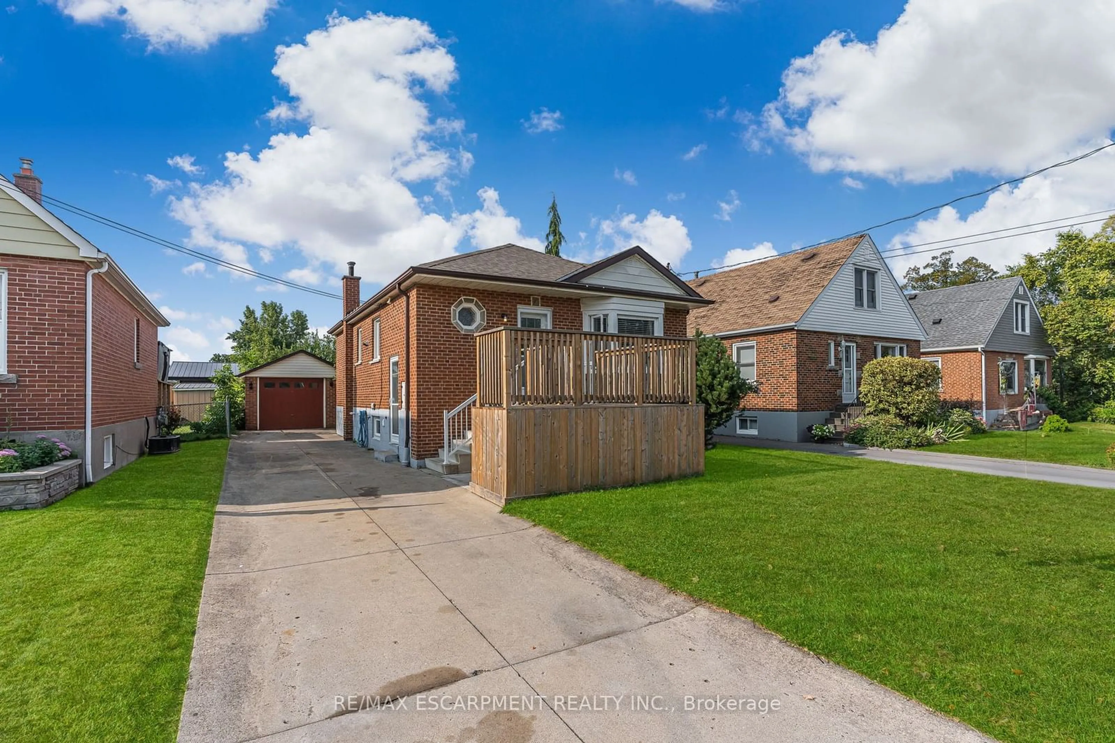 Frontside or backside of a home, the fenced backyard for 280 Montrose Ave, Hamilton Ontario L8K 4Z6