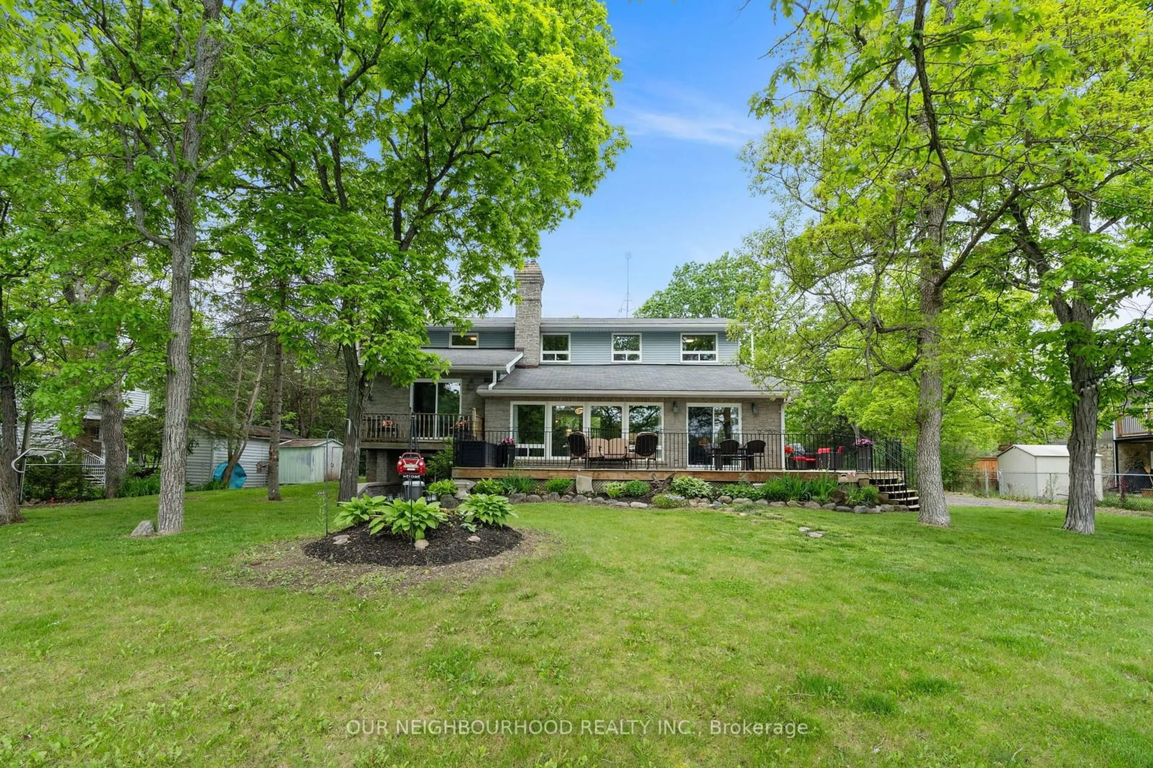 Frontside or backside of a home, the fenced backyard for 363 Hillside Dr, Trent Hills Ontario K0L 1L0