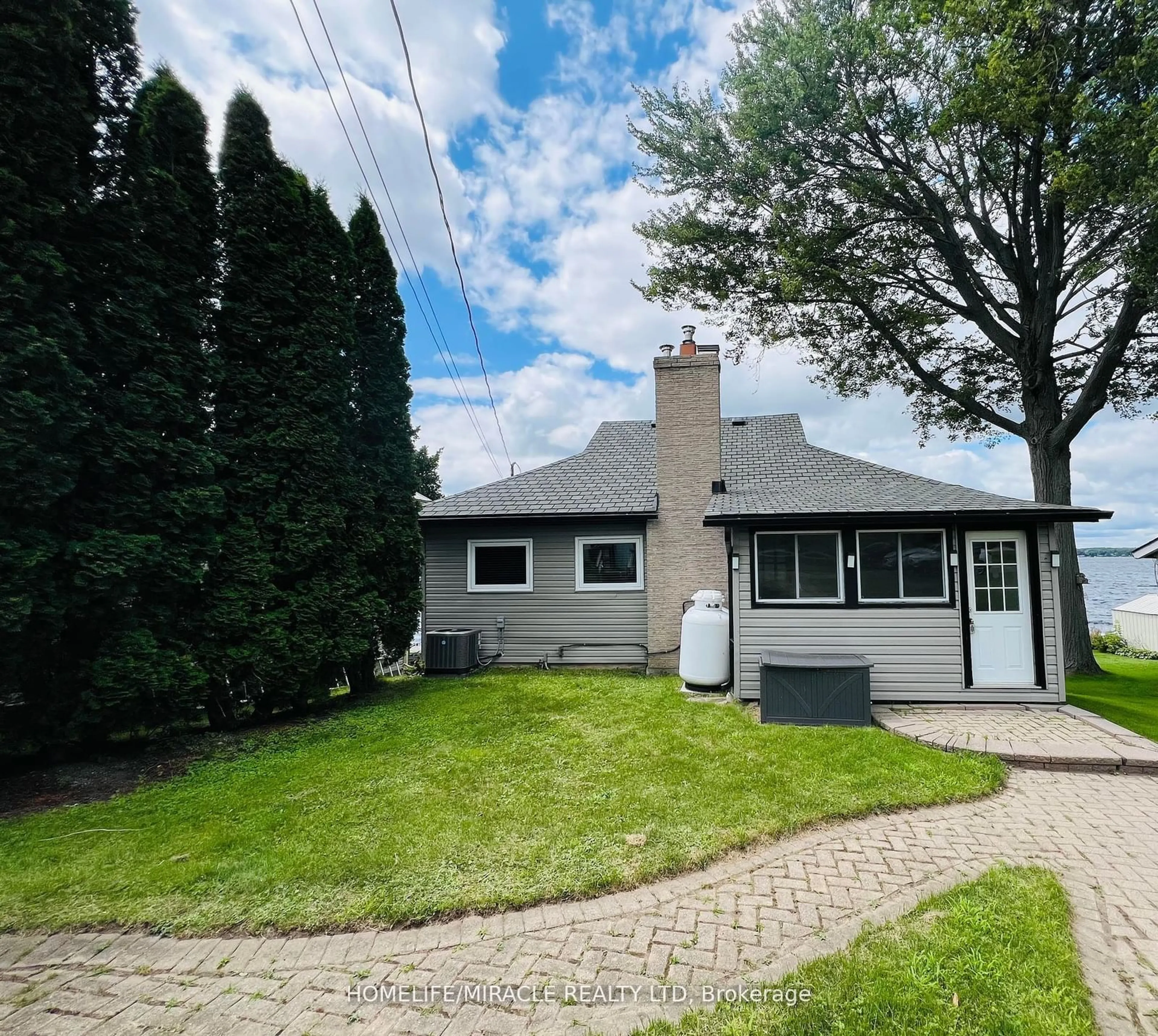 Frontside or backside of a home for 213 Snug Harbour Rd, Kawartha Lakes Ontario K9V 4R6