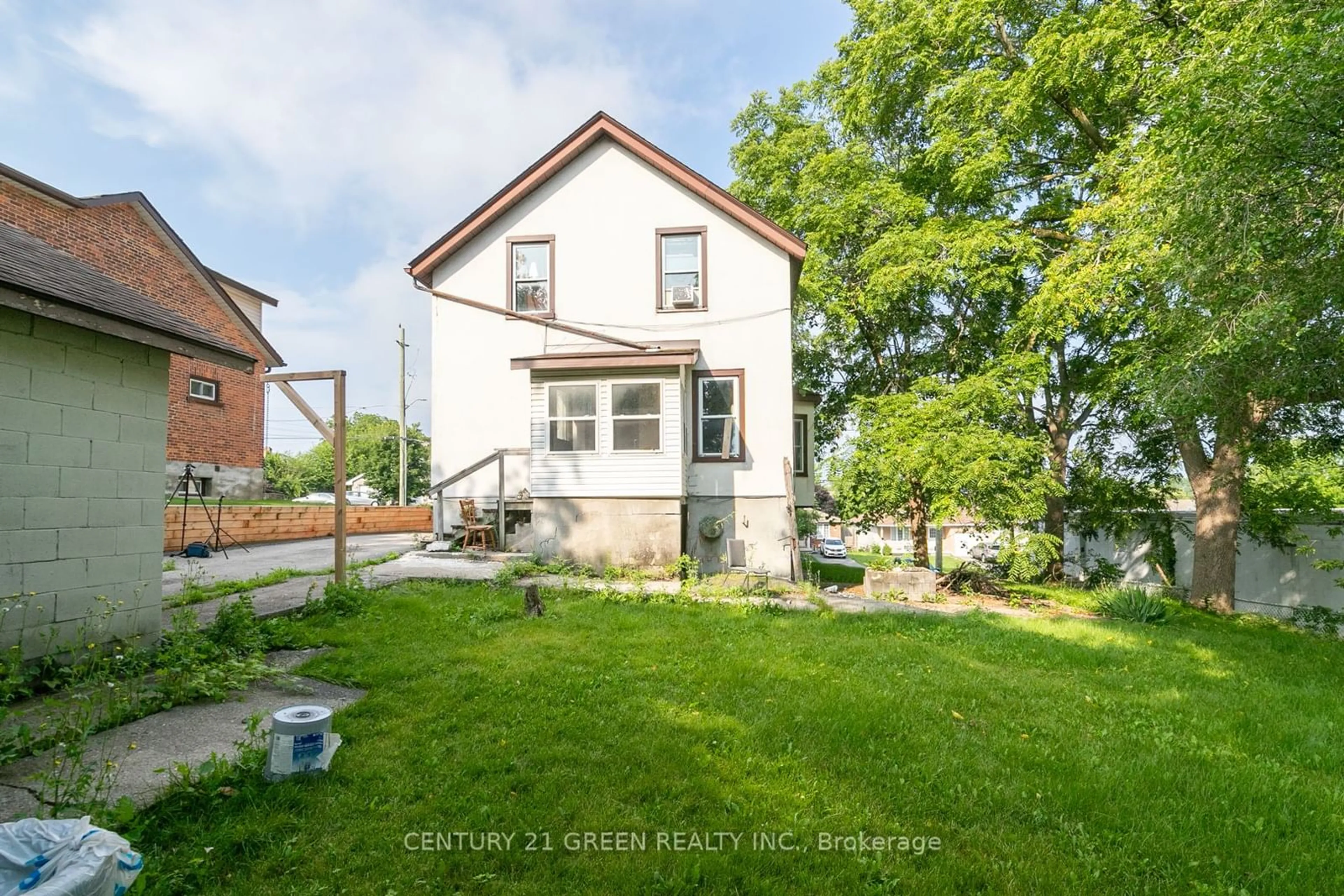 Frontside or backside of a home, the fenced backyard for 199 Lingham St, Belleville Ontario K8N 3T5