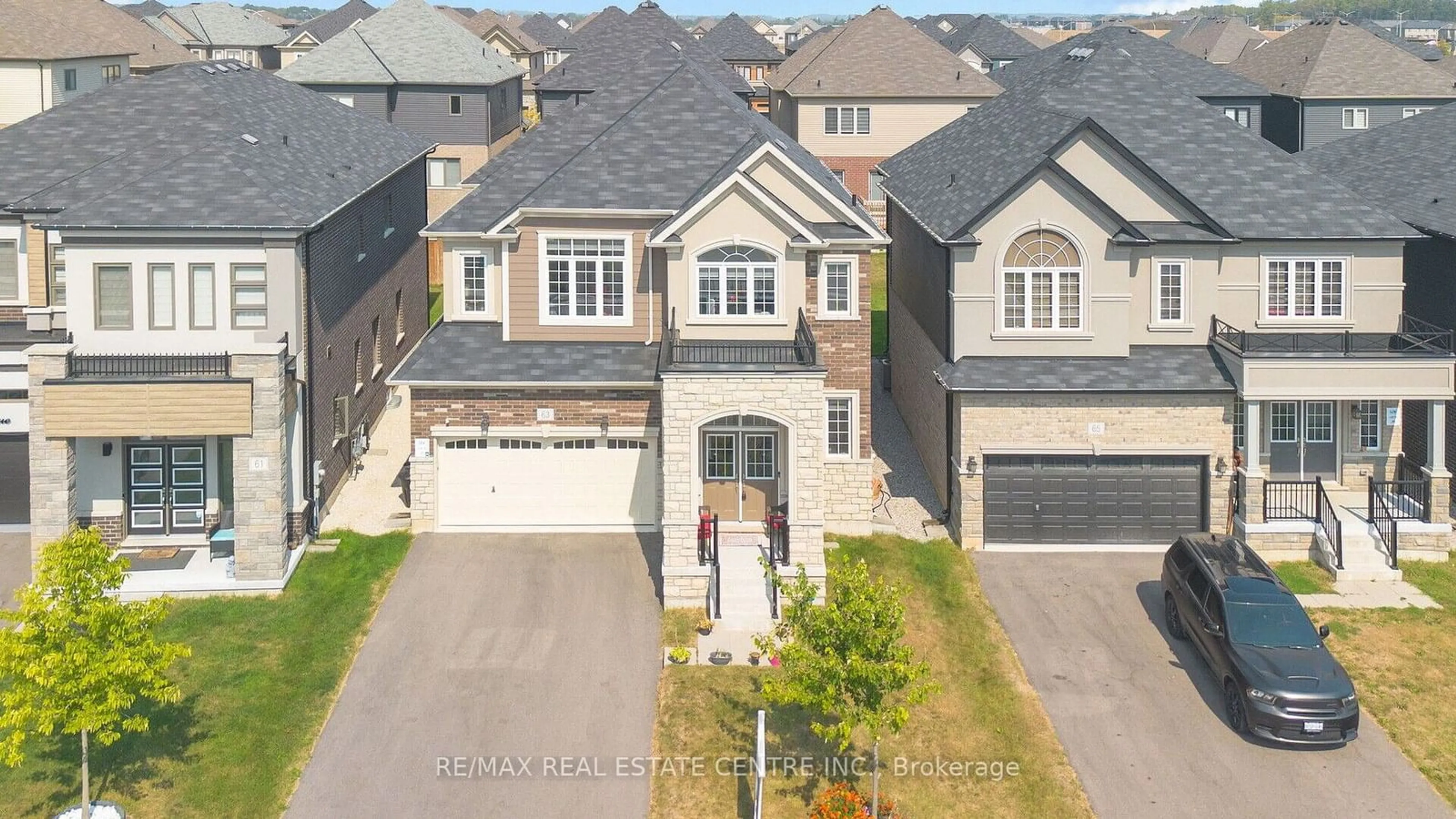 Frontside or backside of a home, the street view for 63 Flagg Ave, Brant Ontario N3L 3E3