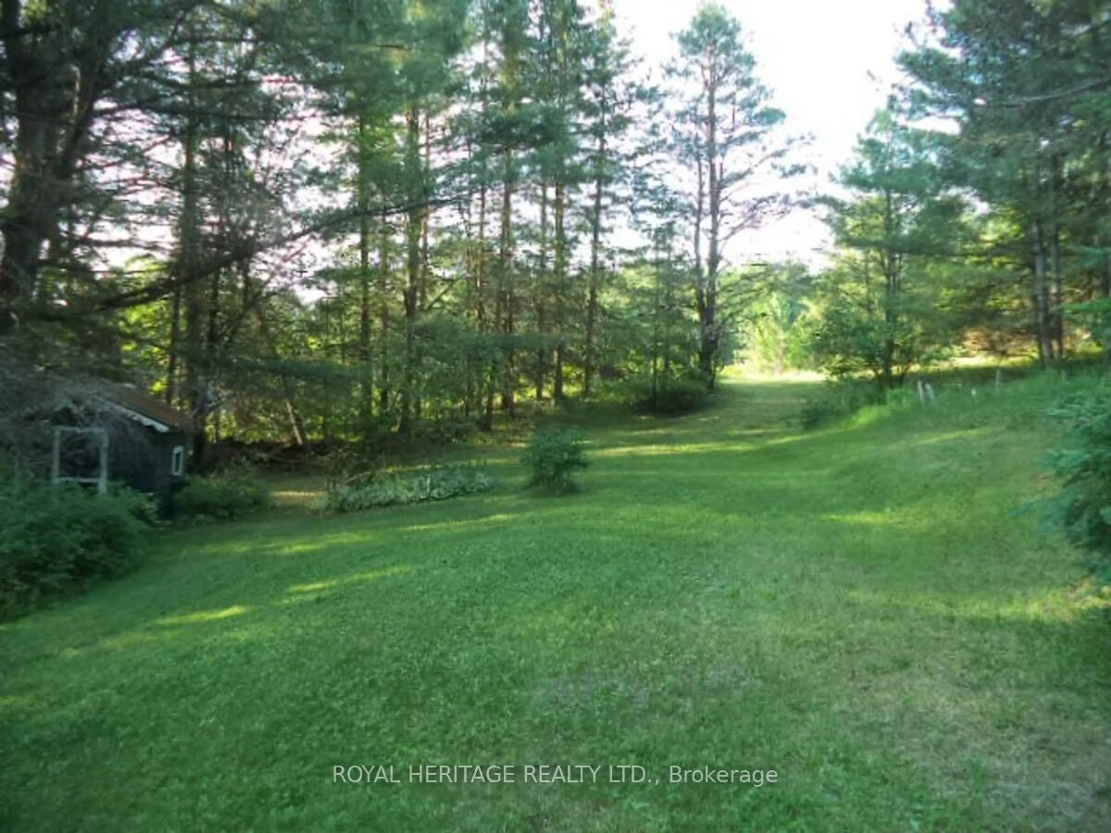 A pic from exterior of the house or condo, the fenced backyard for 22706 Highway 41, Addington Highlands Ontario K0H 1L0