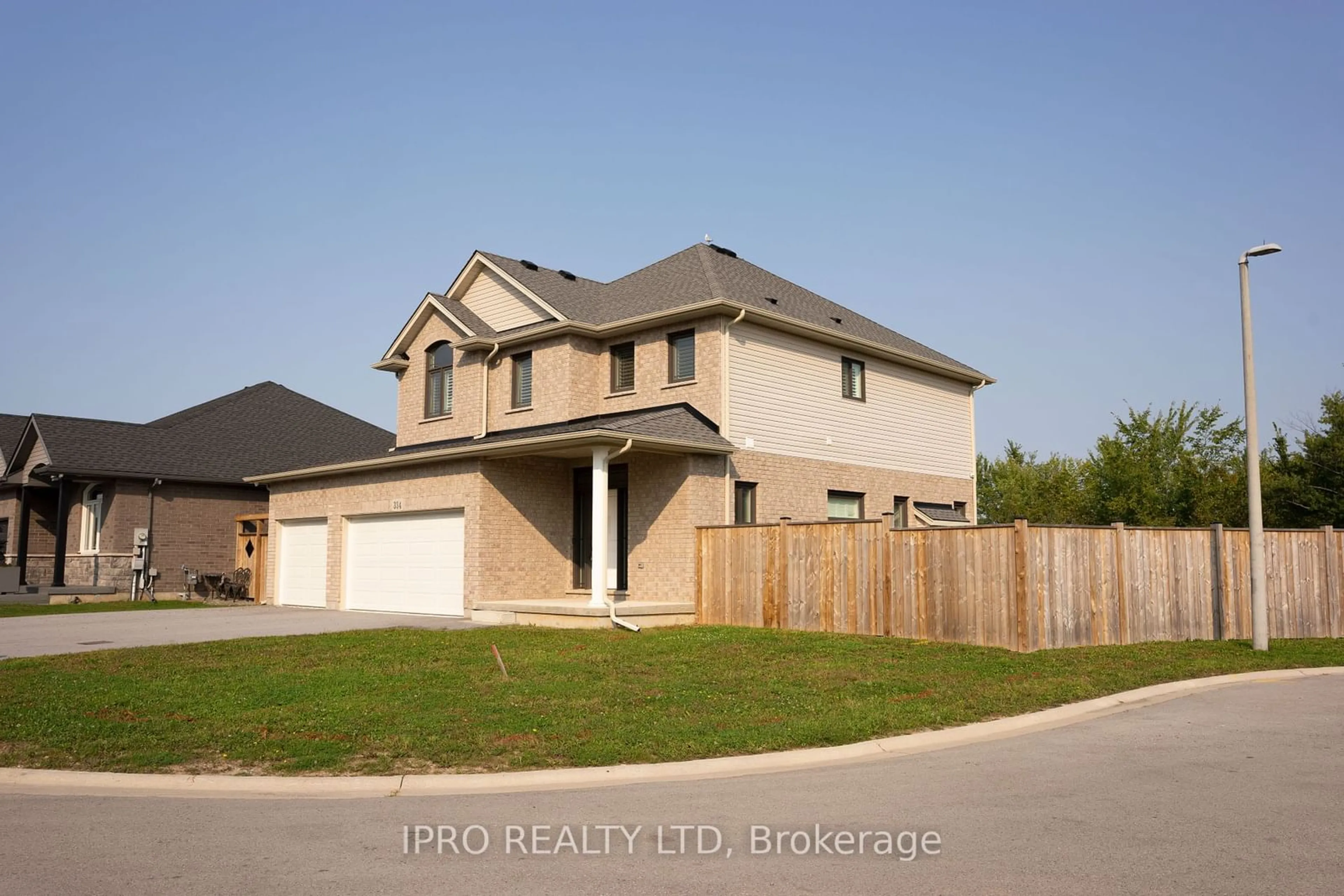 Frontside or backside of a home, the fenced backyard for 334 Viger Dr, Welland Ontario L3B 5E9