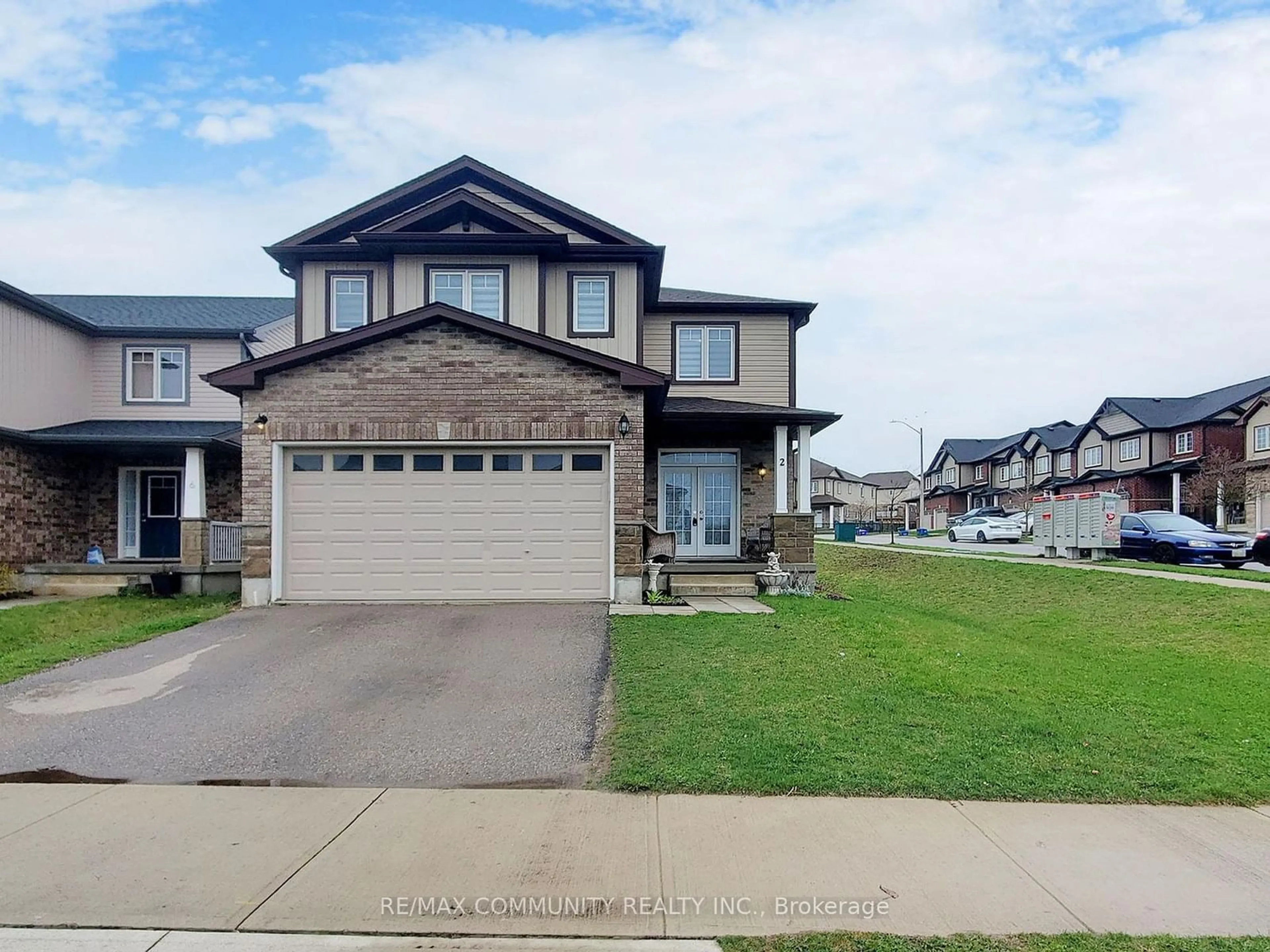 Frontside or backside of a home, the street view for 2 Castlebay St, Kitchener Ontario N2R 0G5