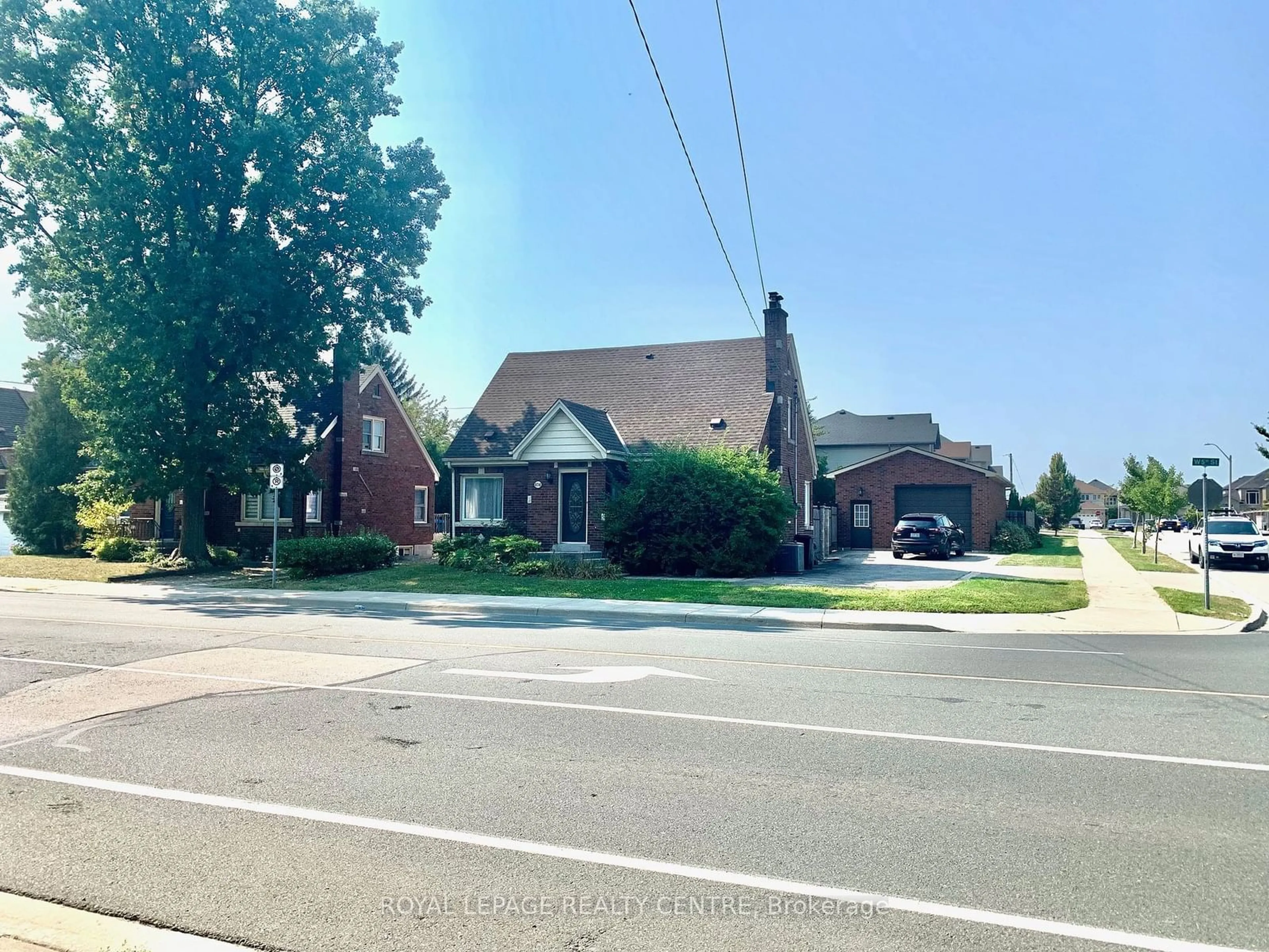 Frontside or backside of a home, the street view for 876 West 5th St, Hamilton Ontario L9C 5R5