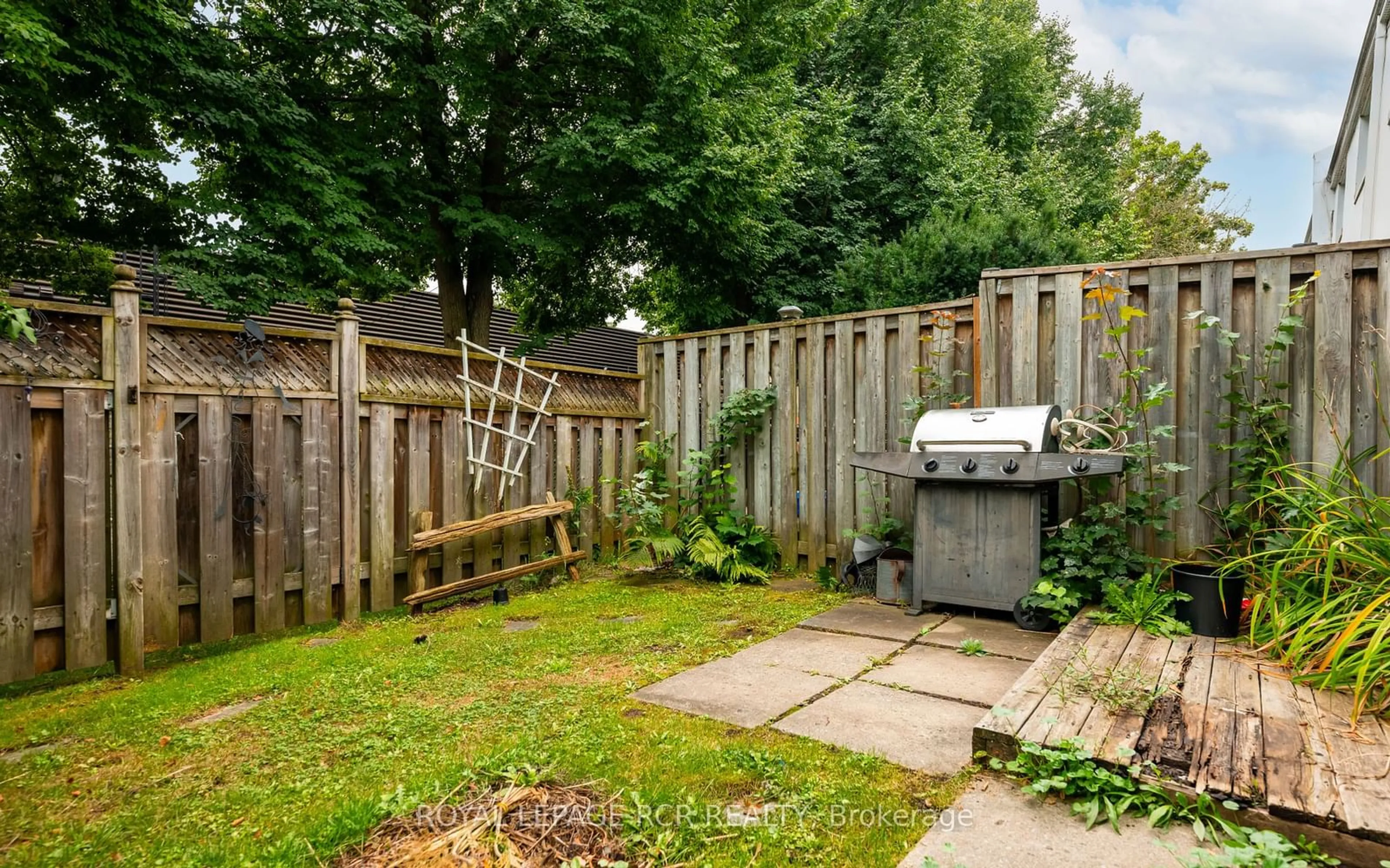 Patio, the fenced backyard for 325 William St #49, Shelburne Ontario L9V 2X6