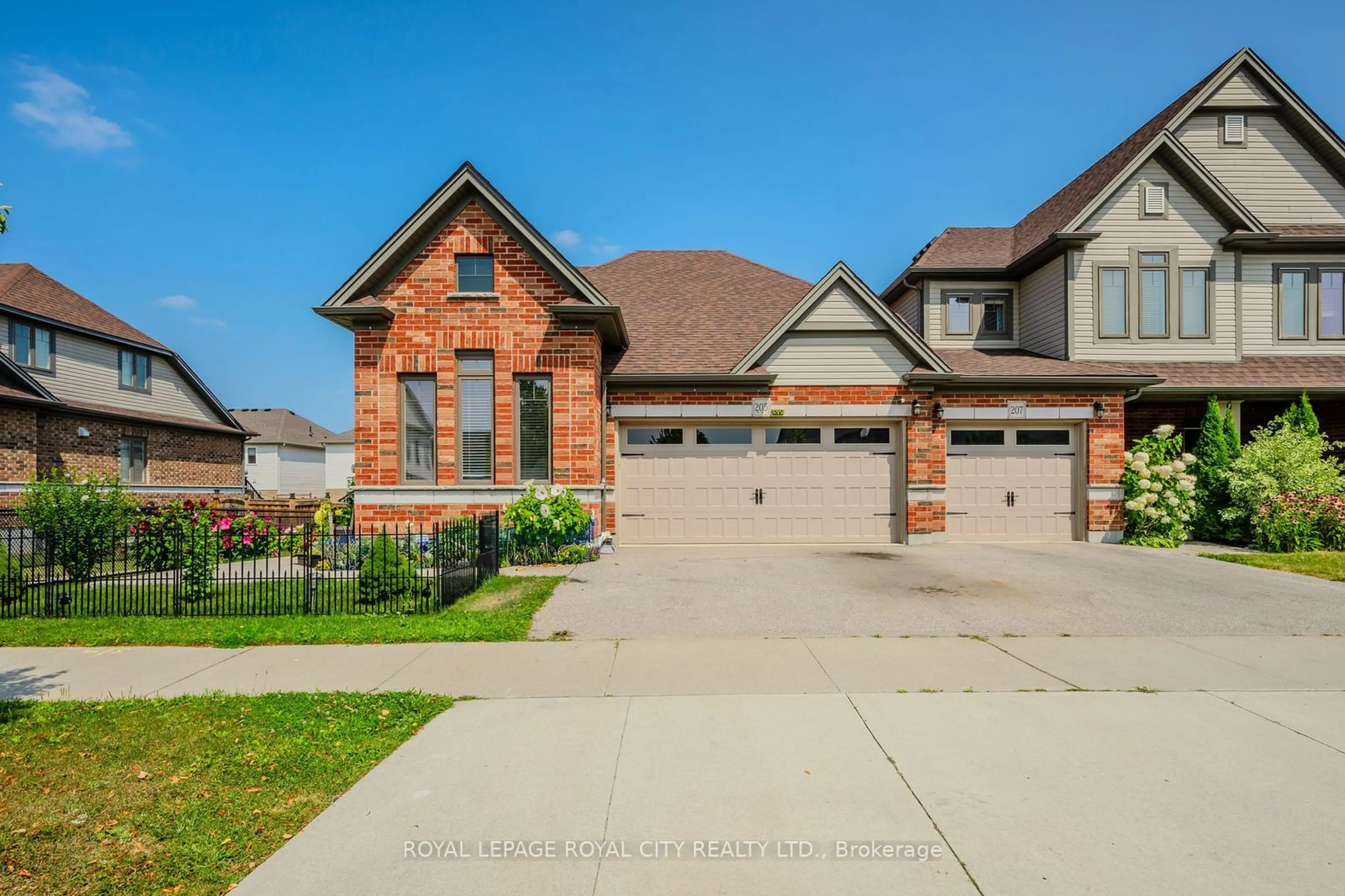 Frontside or backside of a home, the street view for 205 Eden Oak Tr, Kitchener Ontario N2A 0H6