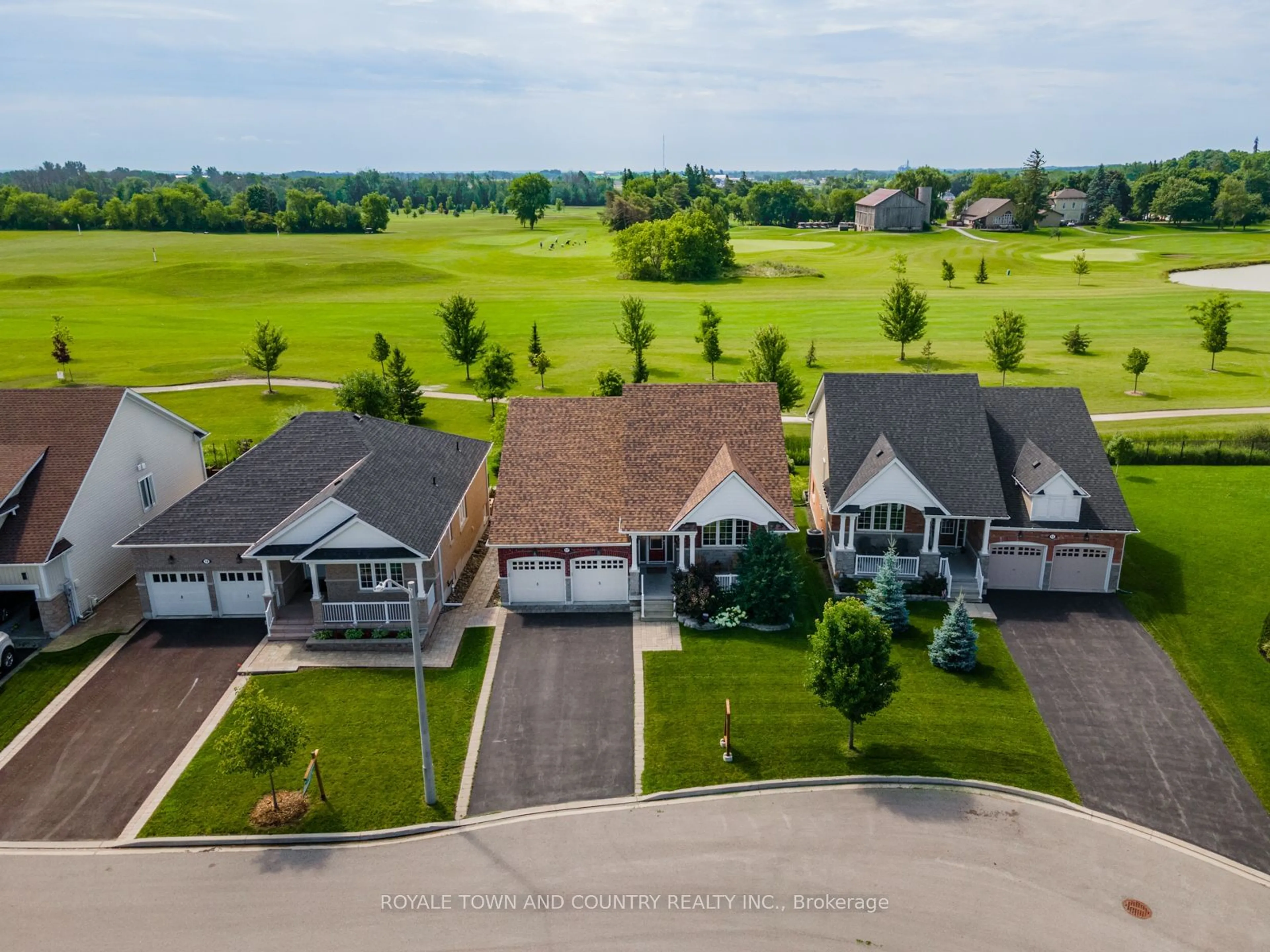 Frontside or backside of a home, the fenced backyard for 17 Logan Lane, Kawartha Lakes Ontario K9V 0L3