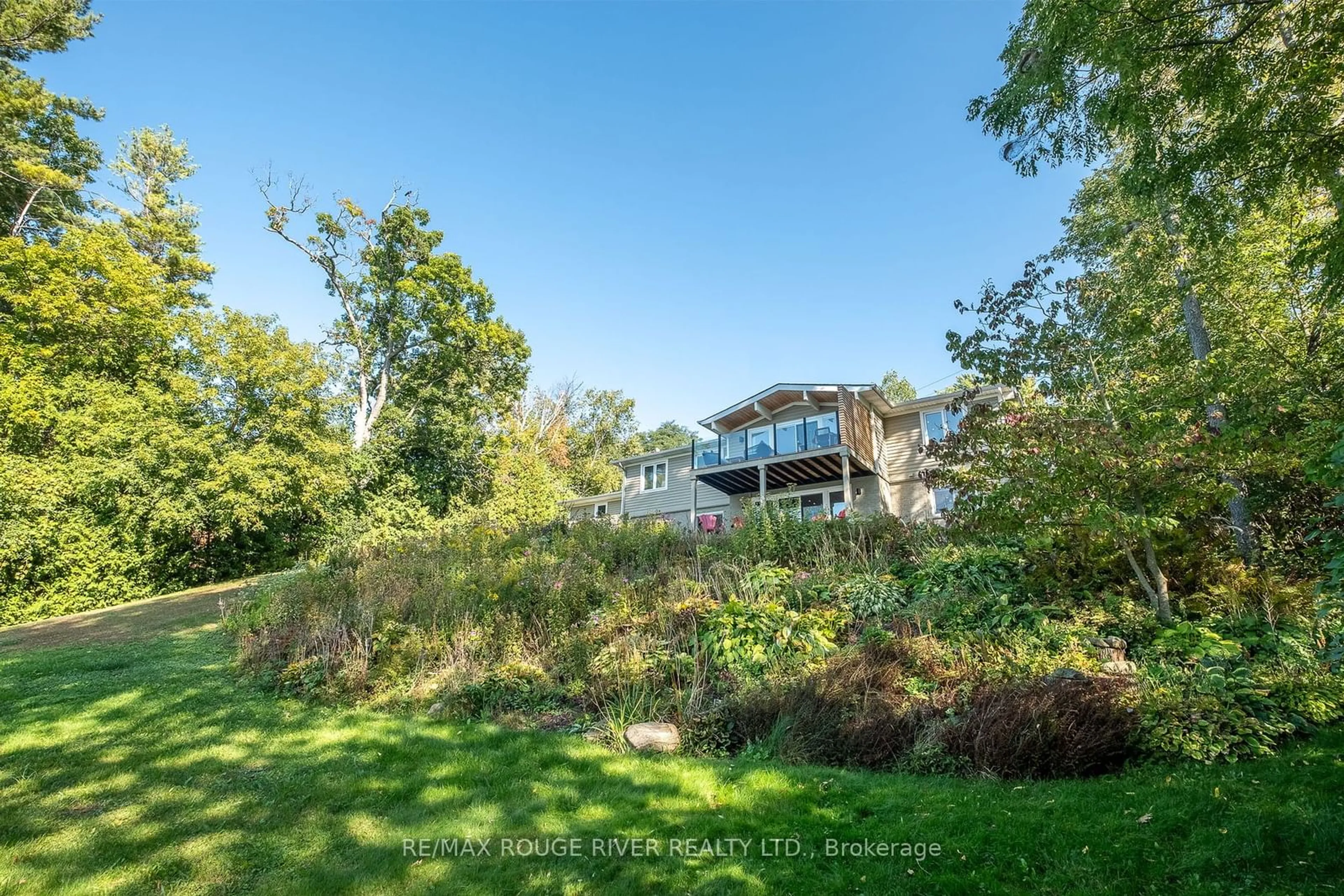 A pic from exterior of the house or condo, the fenced backyard for 7494 Bamsey Dr, Hamilton Township Ontario K0L 1E0