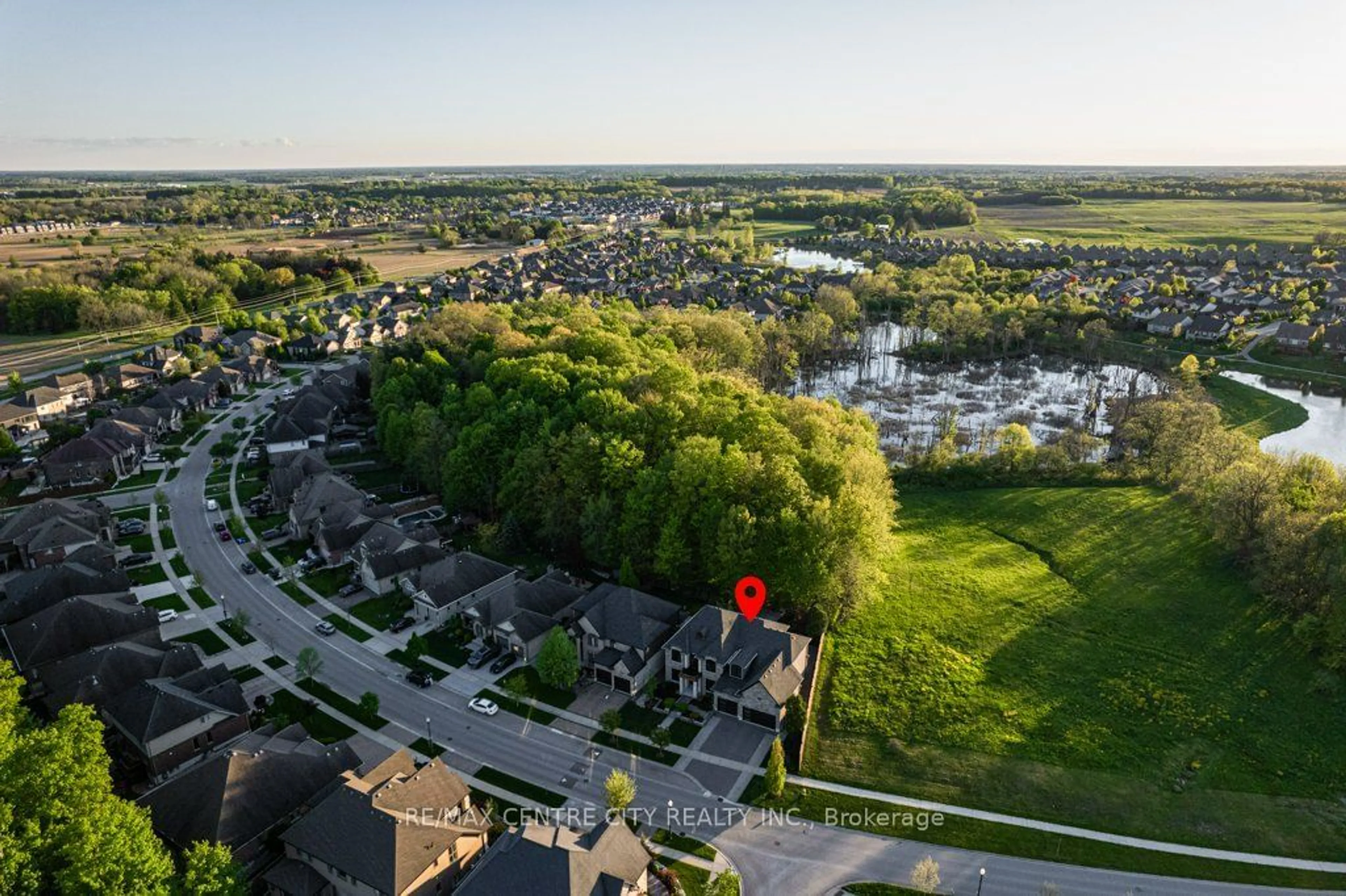 A pic from outside/outdoor area/front of a property/back of a property/a pic from drone, water/lake/river/ocean view for 3553 Settlement Tr, London Ontario N6P 0A8