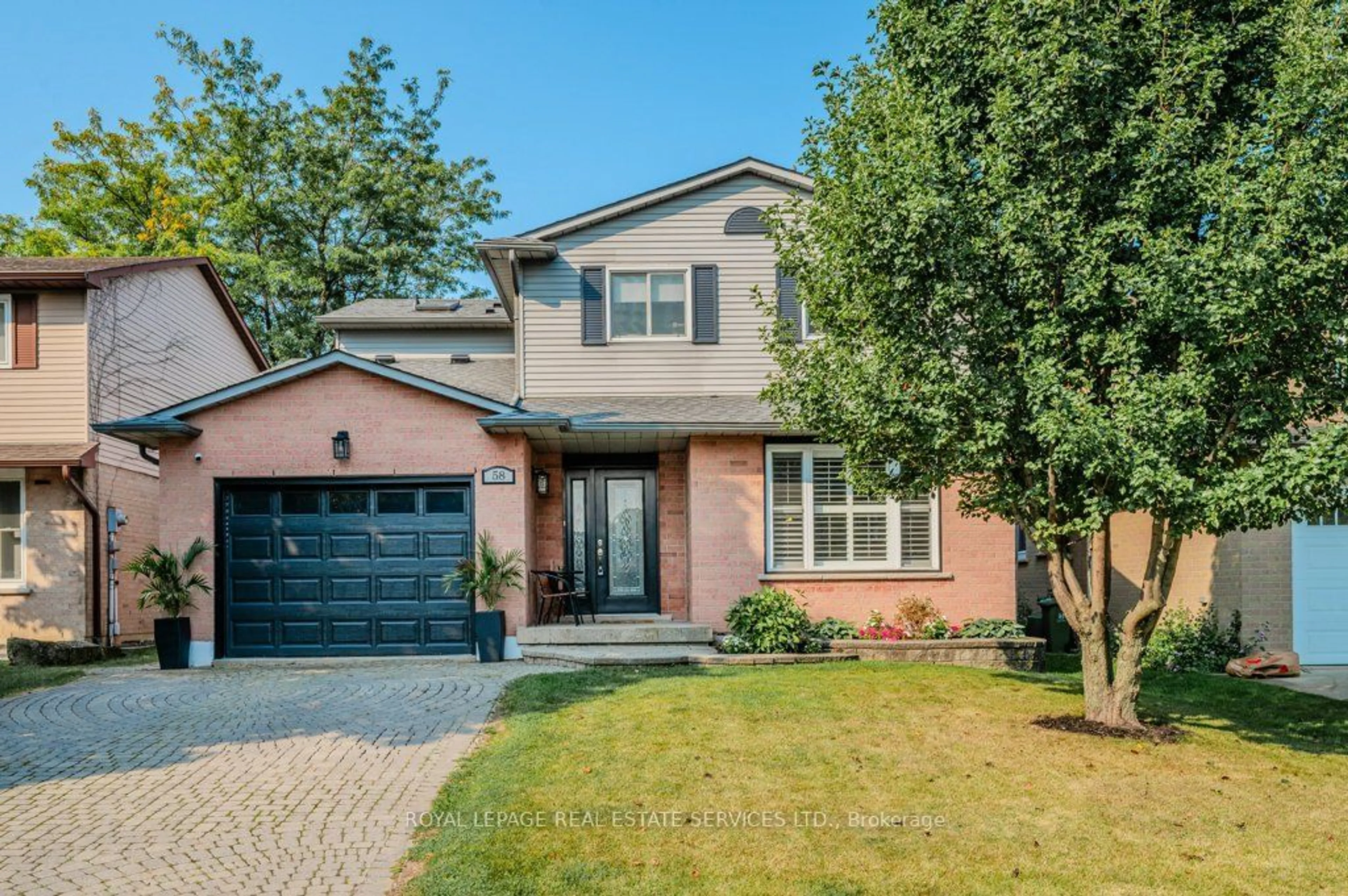 Home with brick exterior material for 58 Dublin Dr, Hamilton Ontario L9B 2B6