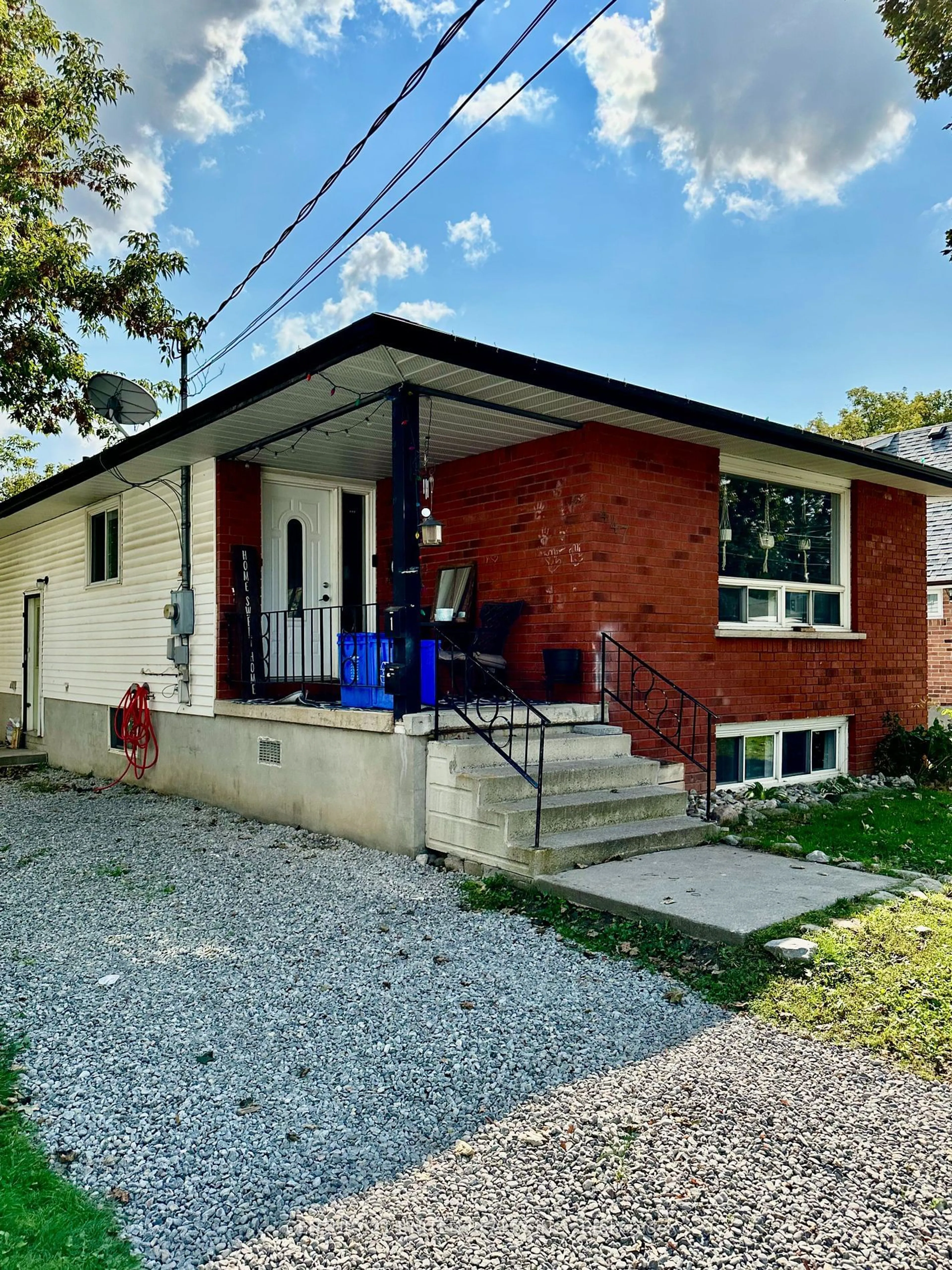 Home with brick exterior material for 447 Edison Ave, Peterborough Ontario K9J 4G4