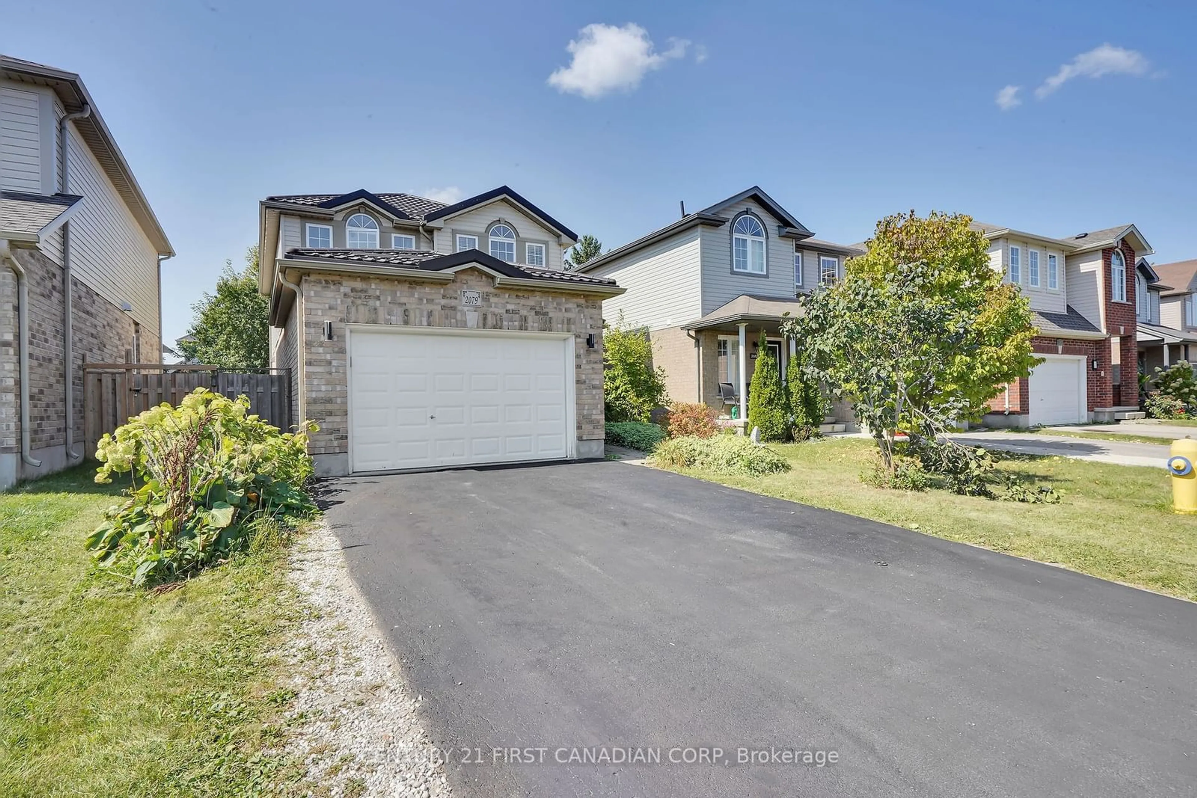 Frontside or backside of a home for 2079 Foxwood Ave, London Ontario N6G 0C7