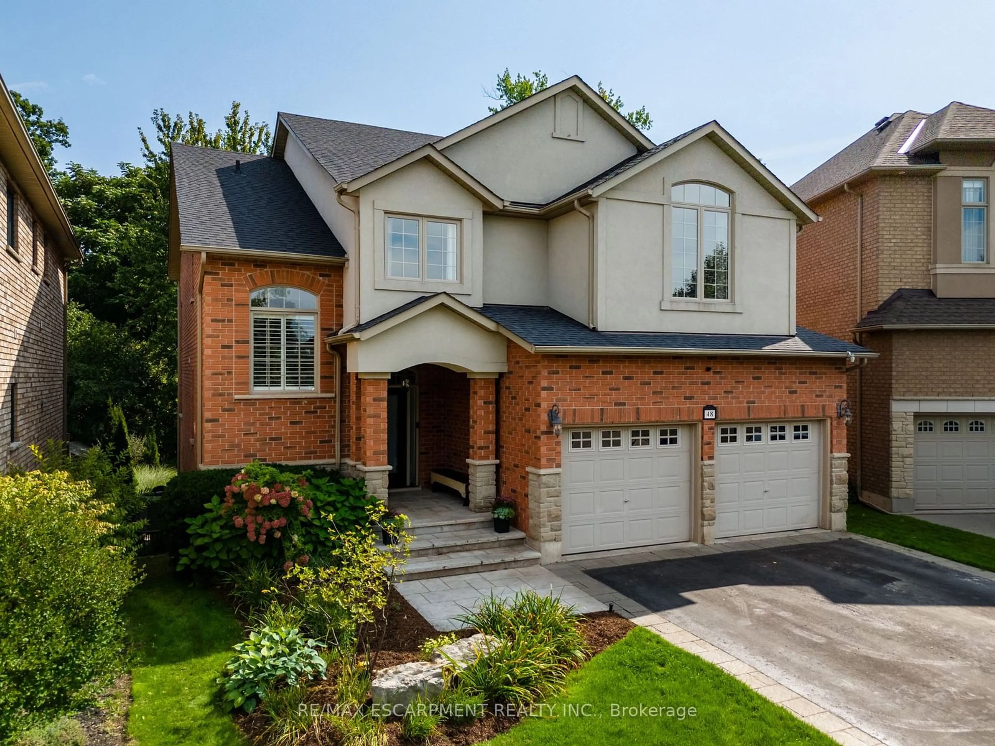 Home with brick exterior material for 48 Commando Crt, Hamilton Ontario L8B 0J6