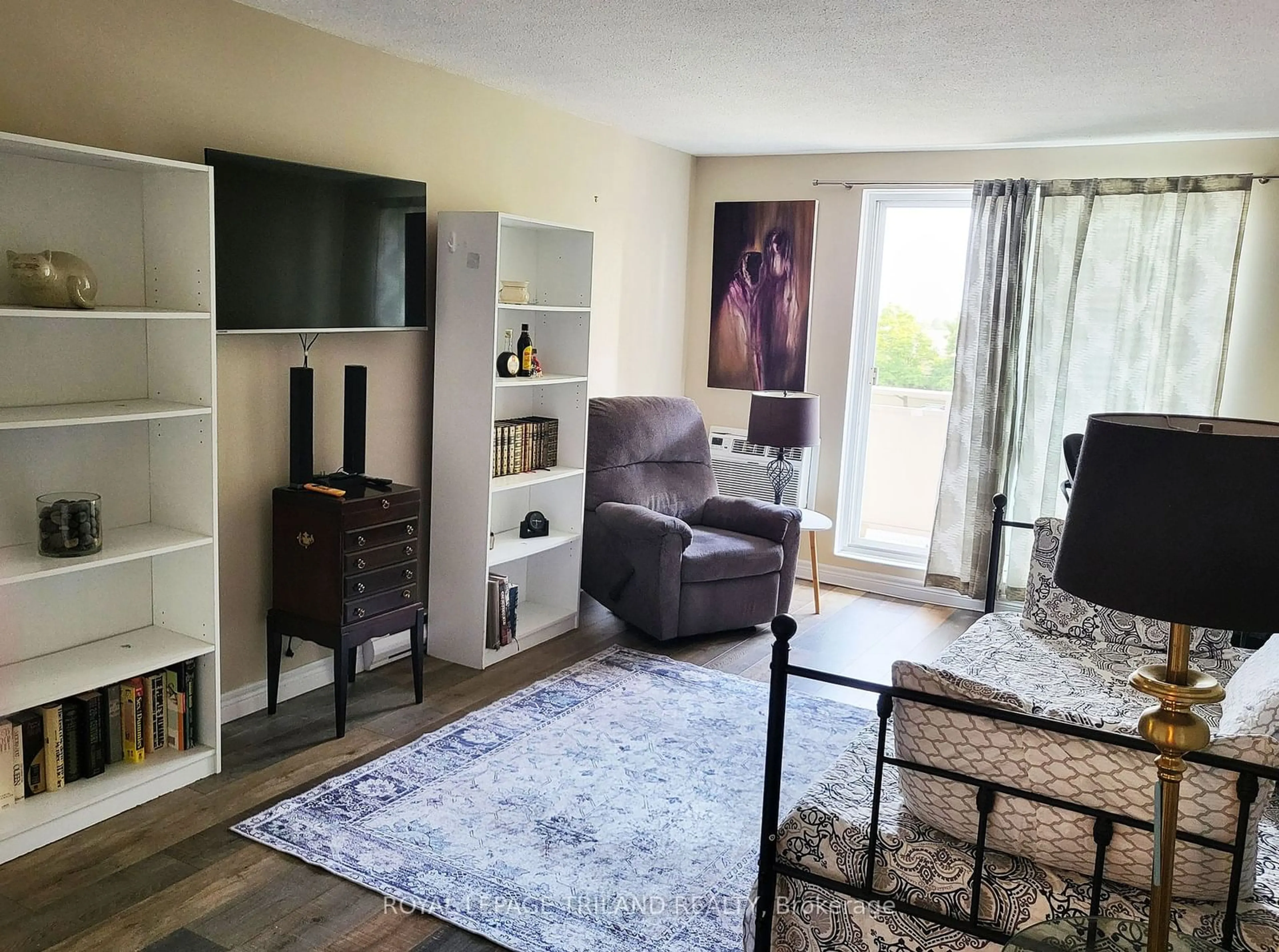 Living room, wood floors for 1104 Jalna Blvd #307, London Ontario N6E 2S6