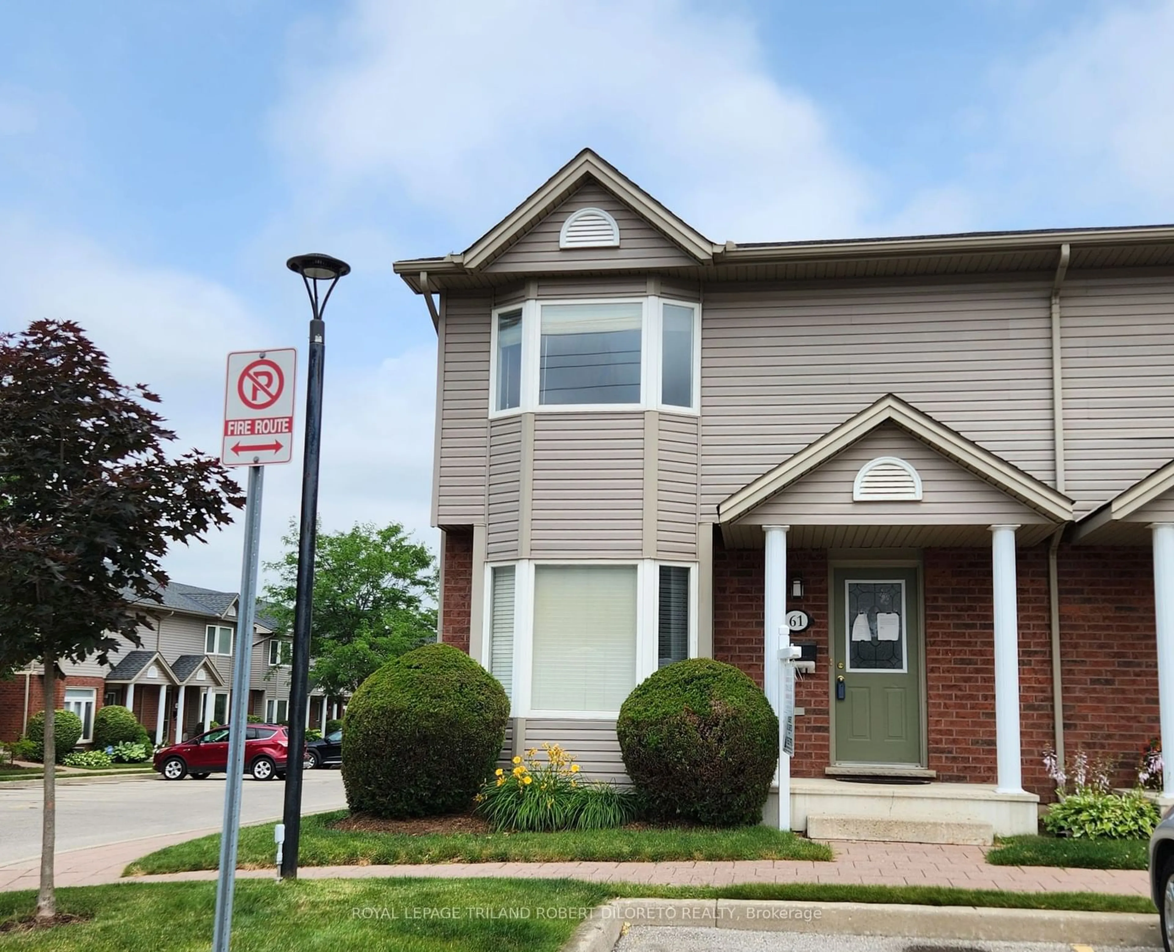 A pic from exterior of the house or condo, the street view for 1535 Trossacks Ave #61, London Ontario N5X 4R1