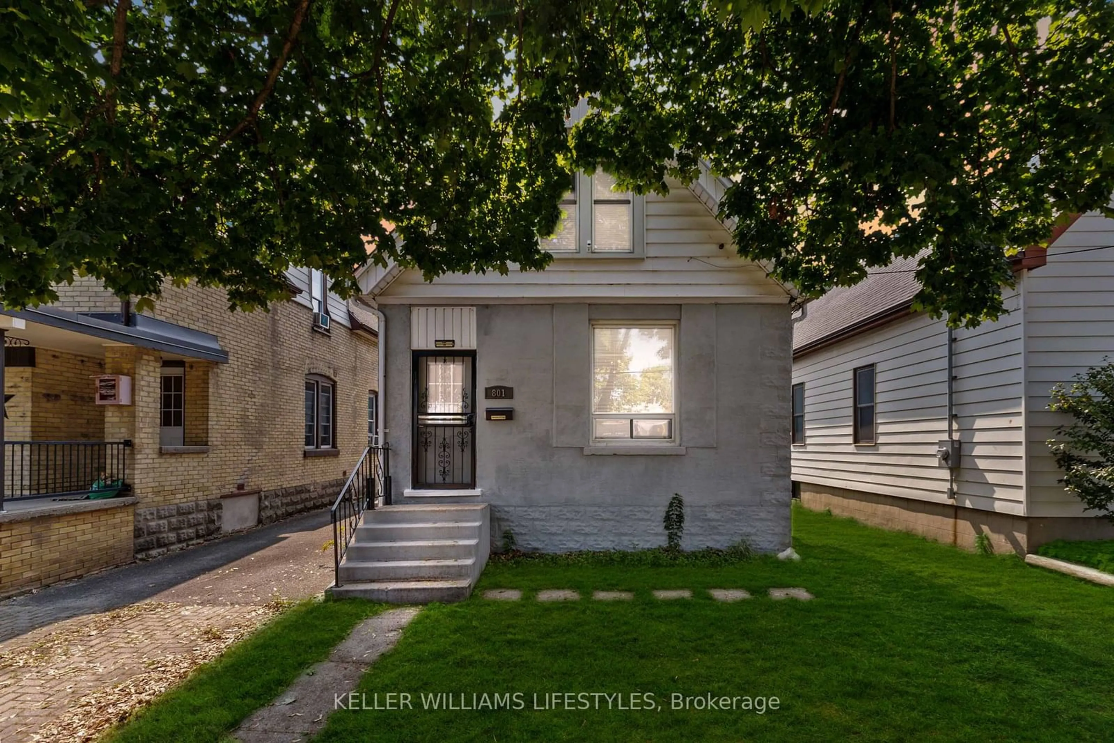 Frontside or backside of a home for 801 Central Ave, London Ontario N5W 3R1