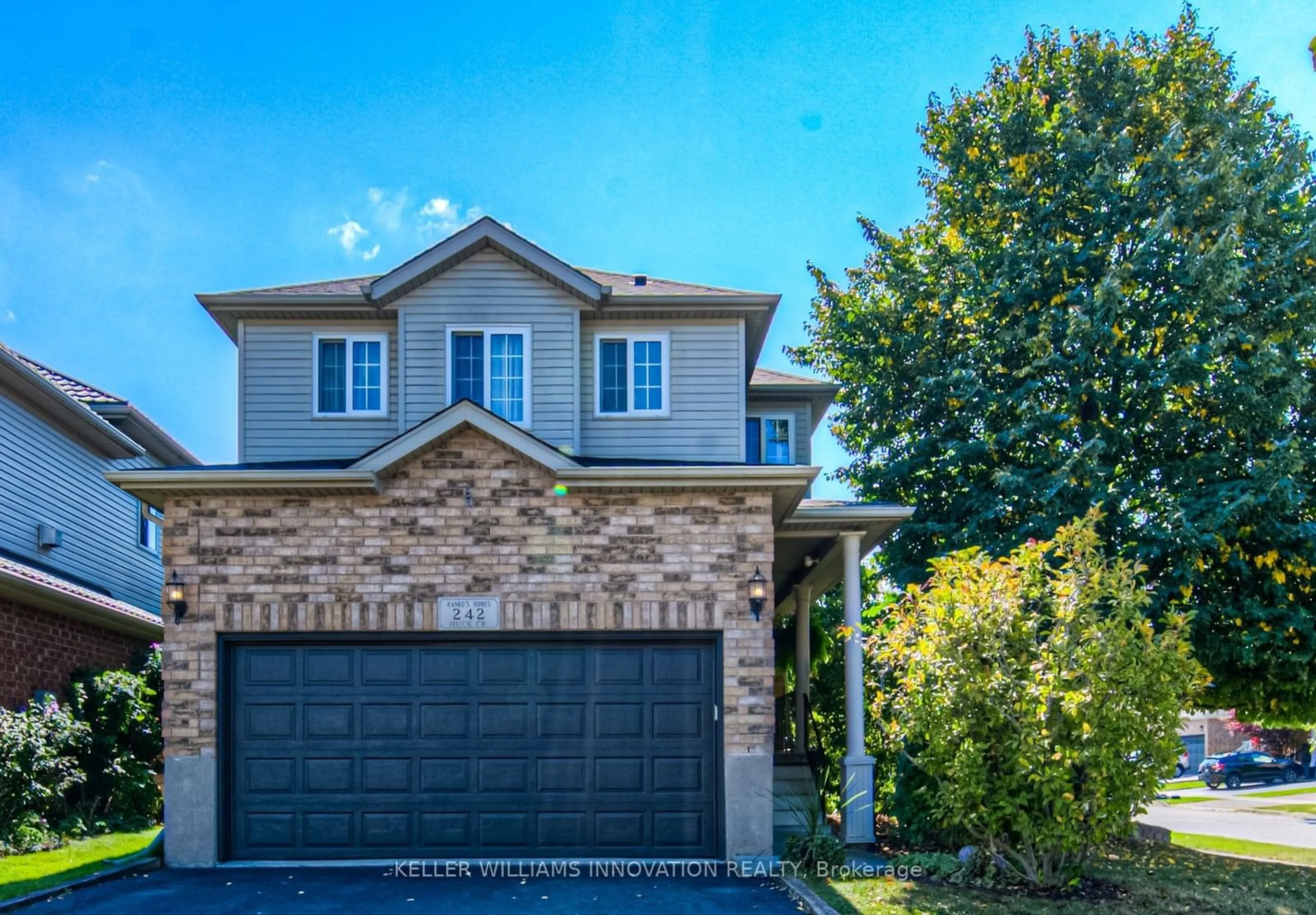 Frontside or backside of a home for 242 Huck Cres, Kitchener Ontario N2N 3M9