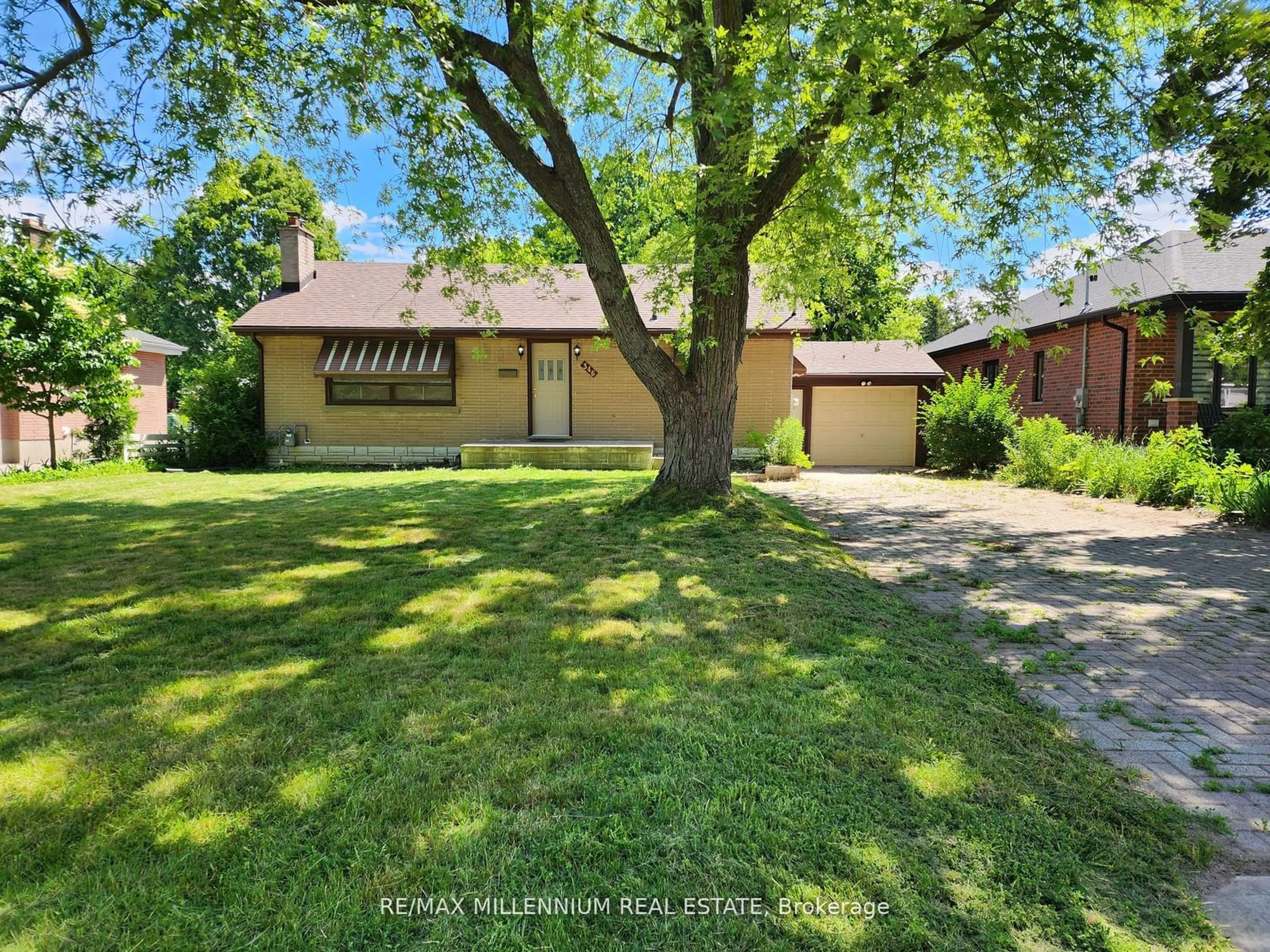 Frontside or backside of a home, the fenced backyard for 346 Reynolds Rd, London Ontario N6K 2P6