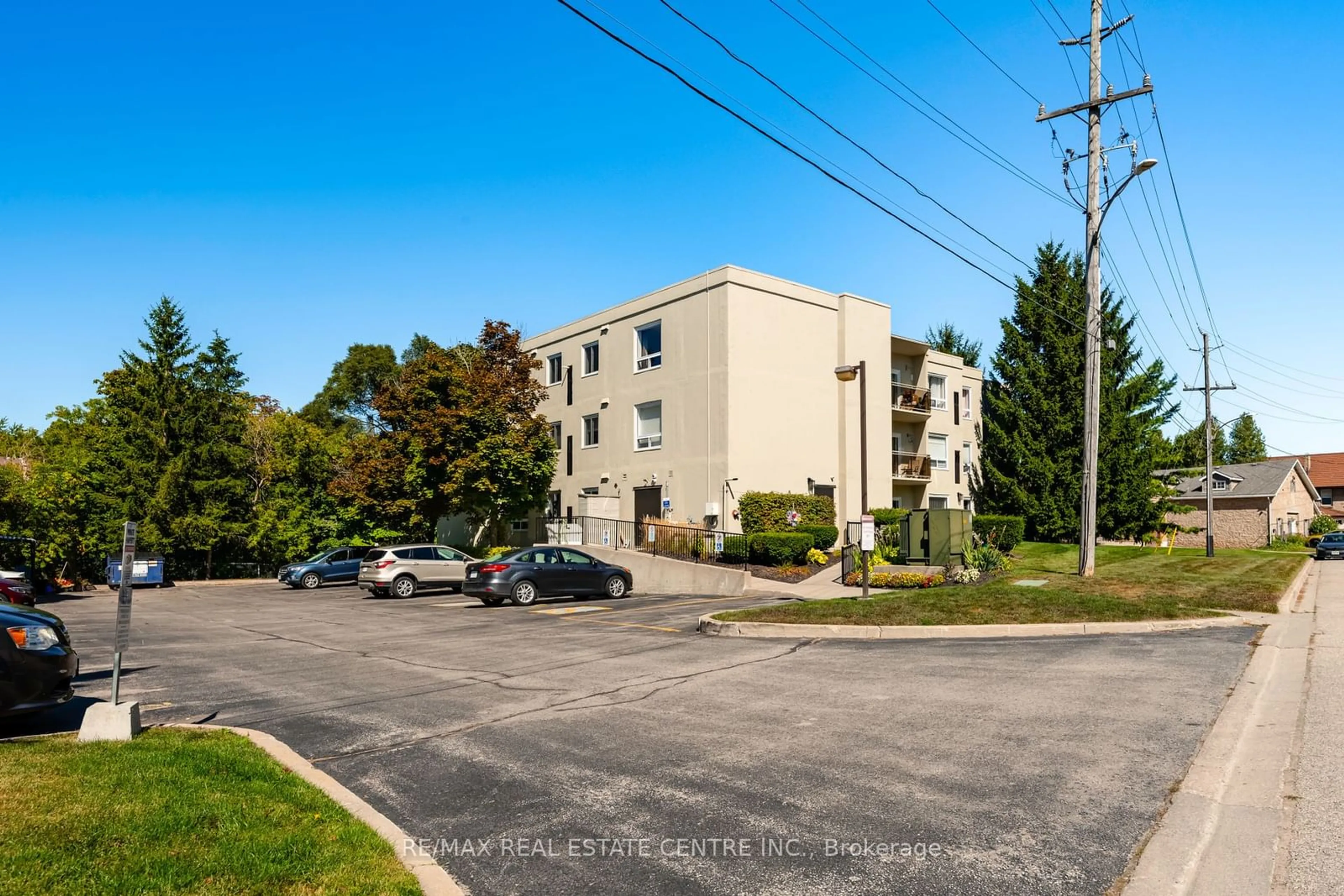 A pic from exterior of the house or condo, the front or back of building for 245 Queen St #101, Centre Wellington Ontario N1M 3R6